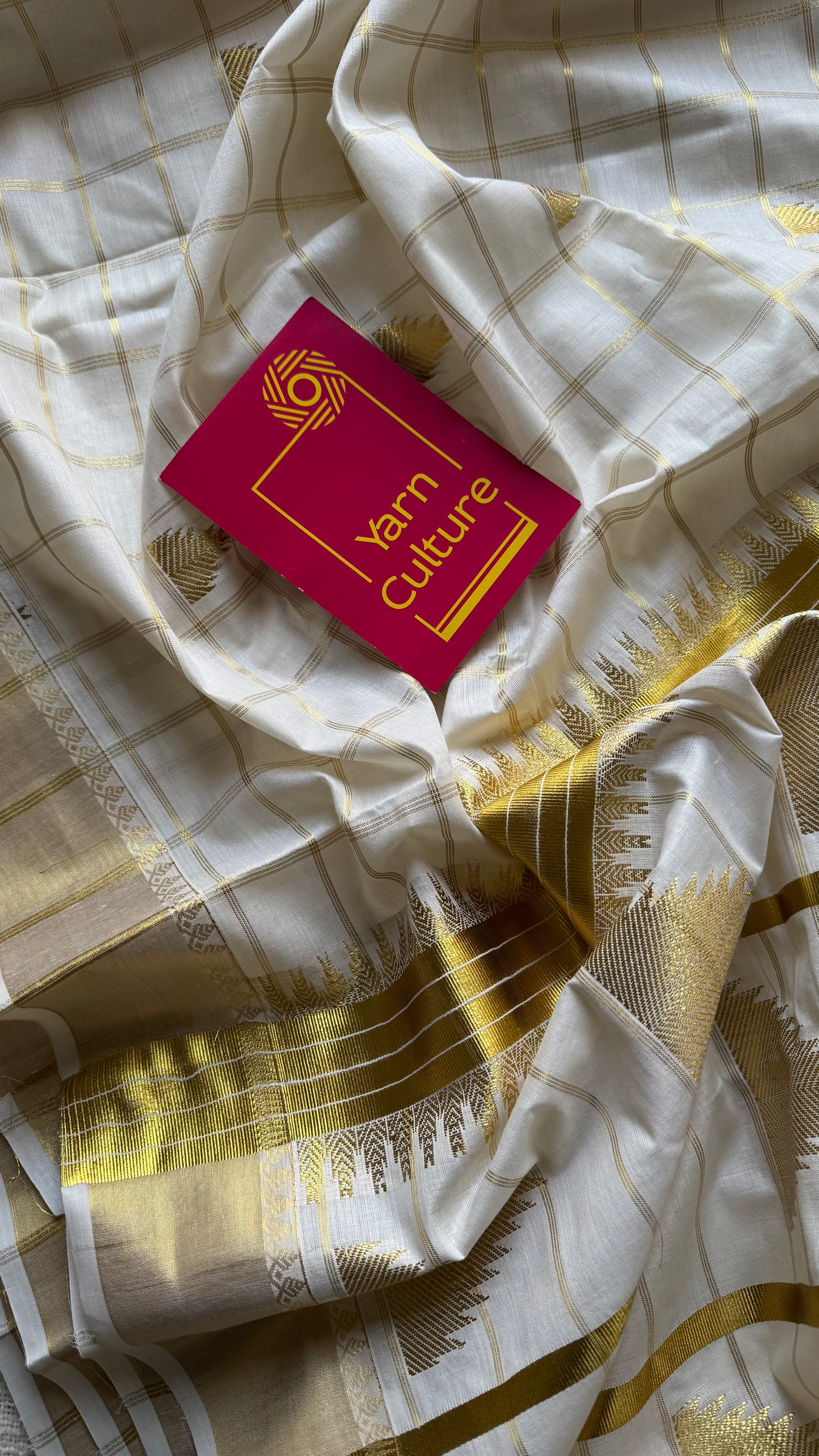 Ivory Kerala cotton saree with checks and gold jacquard motifs - YCIEKCFE319