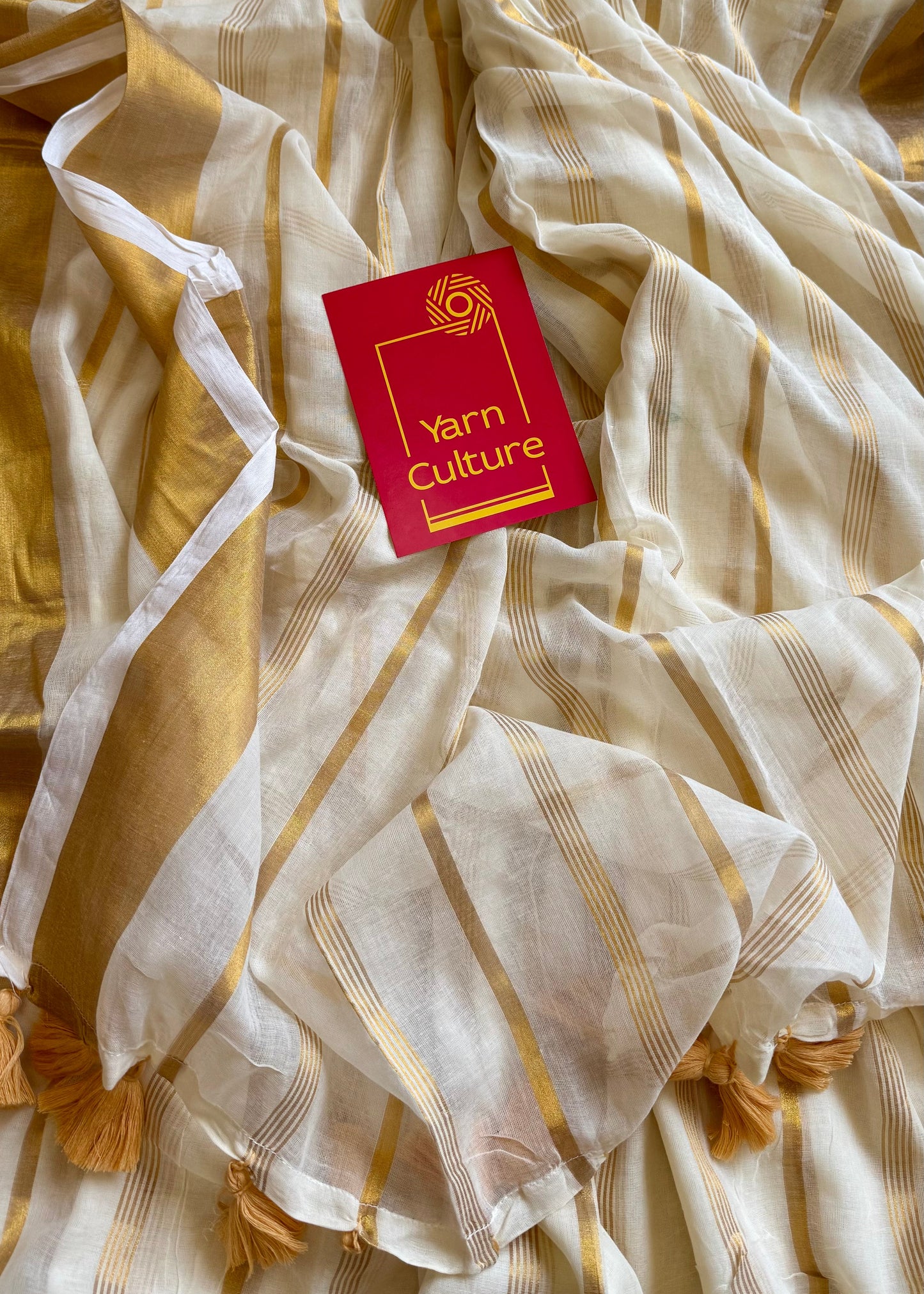Ivory mul saree, gold stripes - YCIEON01