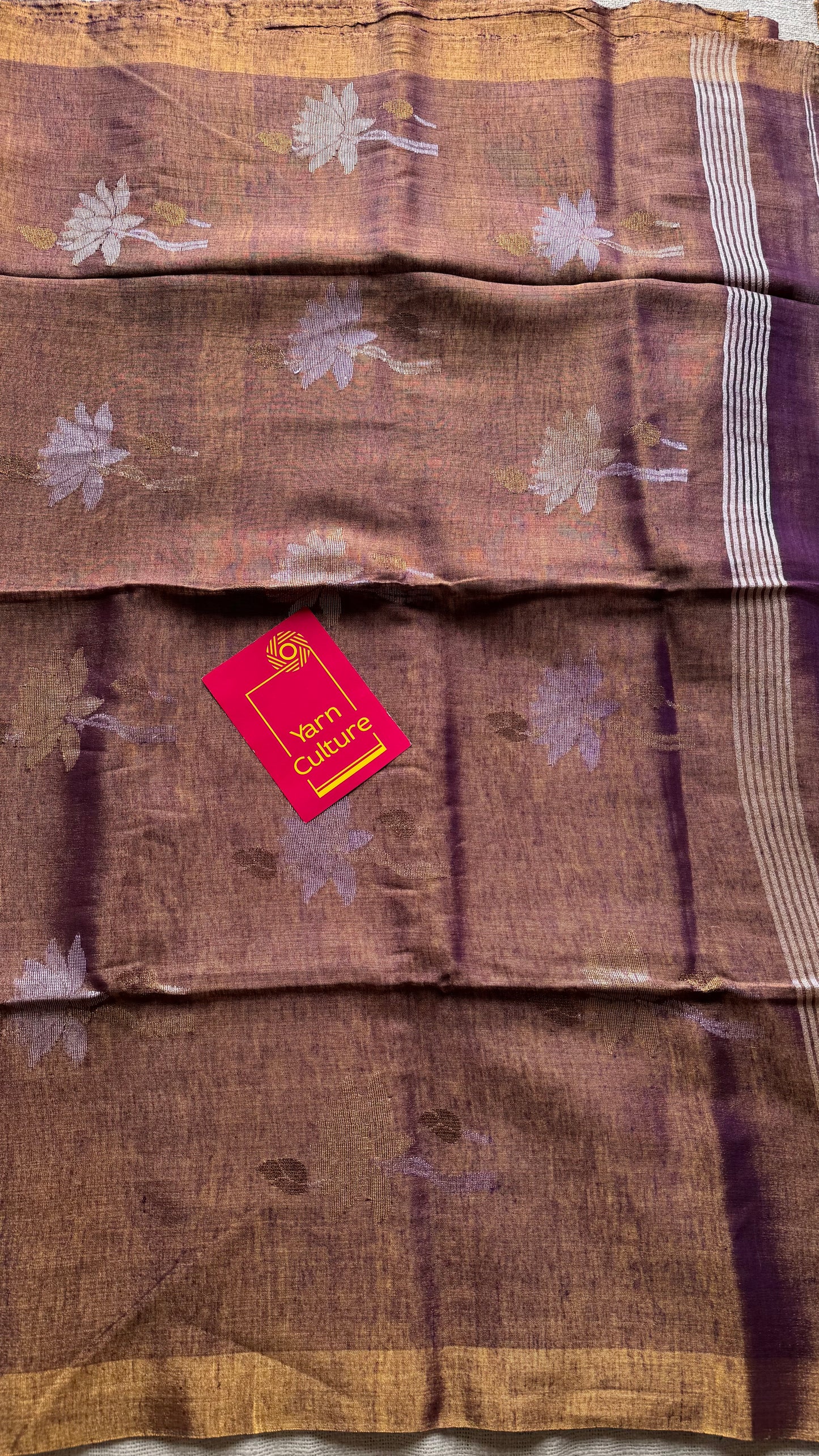 Handwoven purple gold dual tone tissue linen saree with lotus motifs - YCBCLTFE401