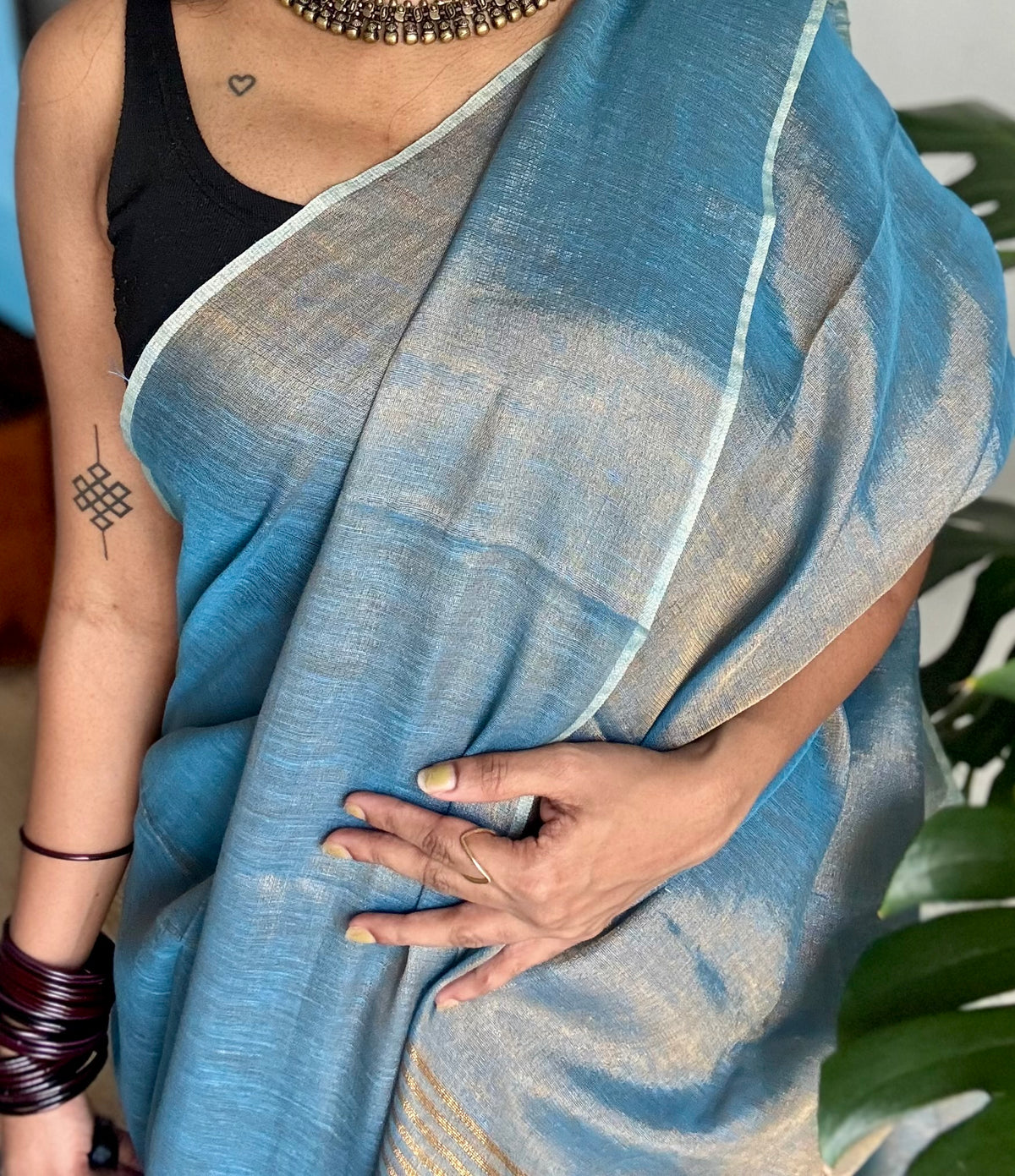 Teal blue with gold, dual tone metallic tissue linen saree - YCBCLTOC59