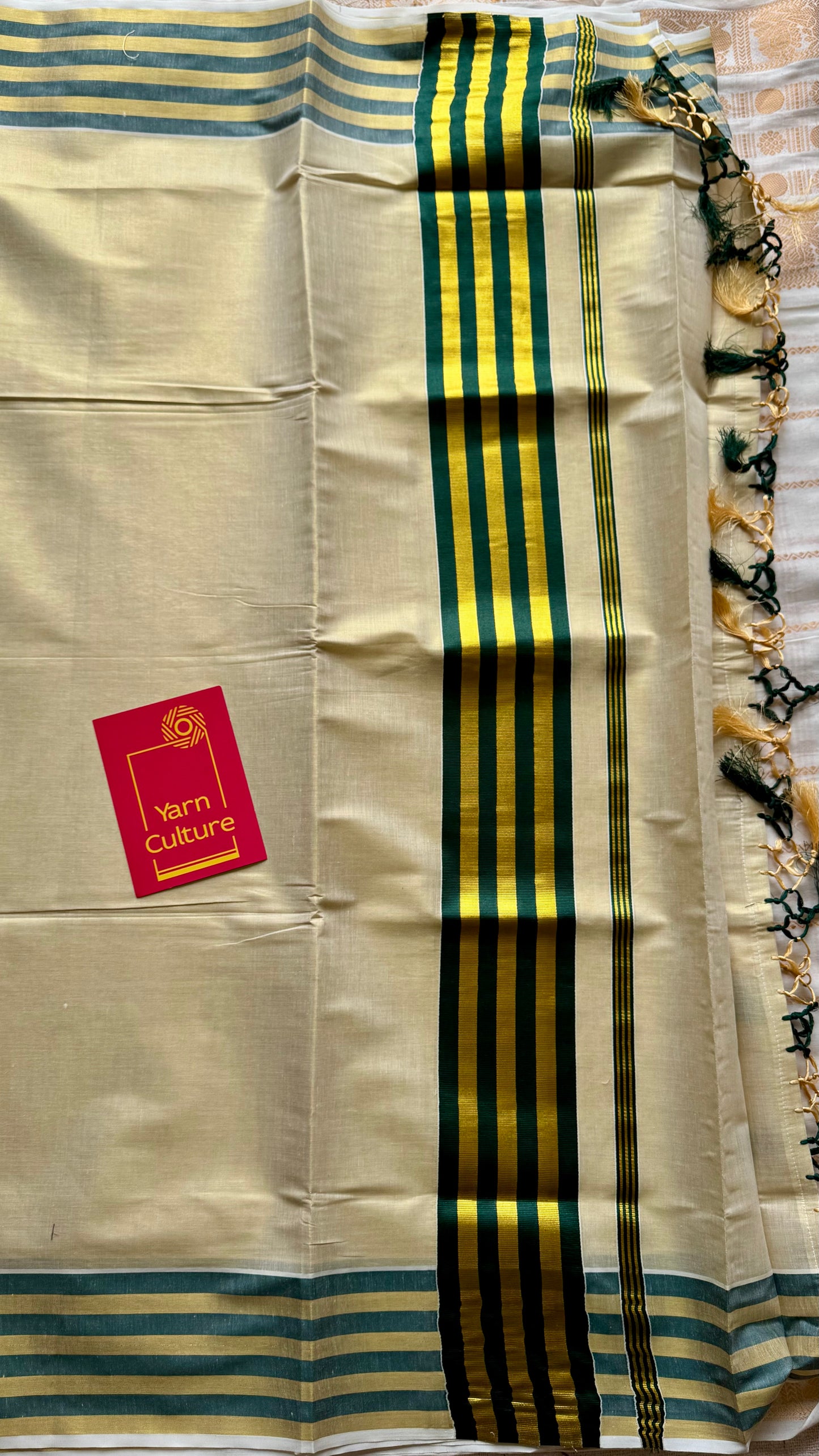 Ivory and gold soft tissue cotton saree, dark green border - YCIEON68
