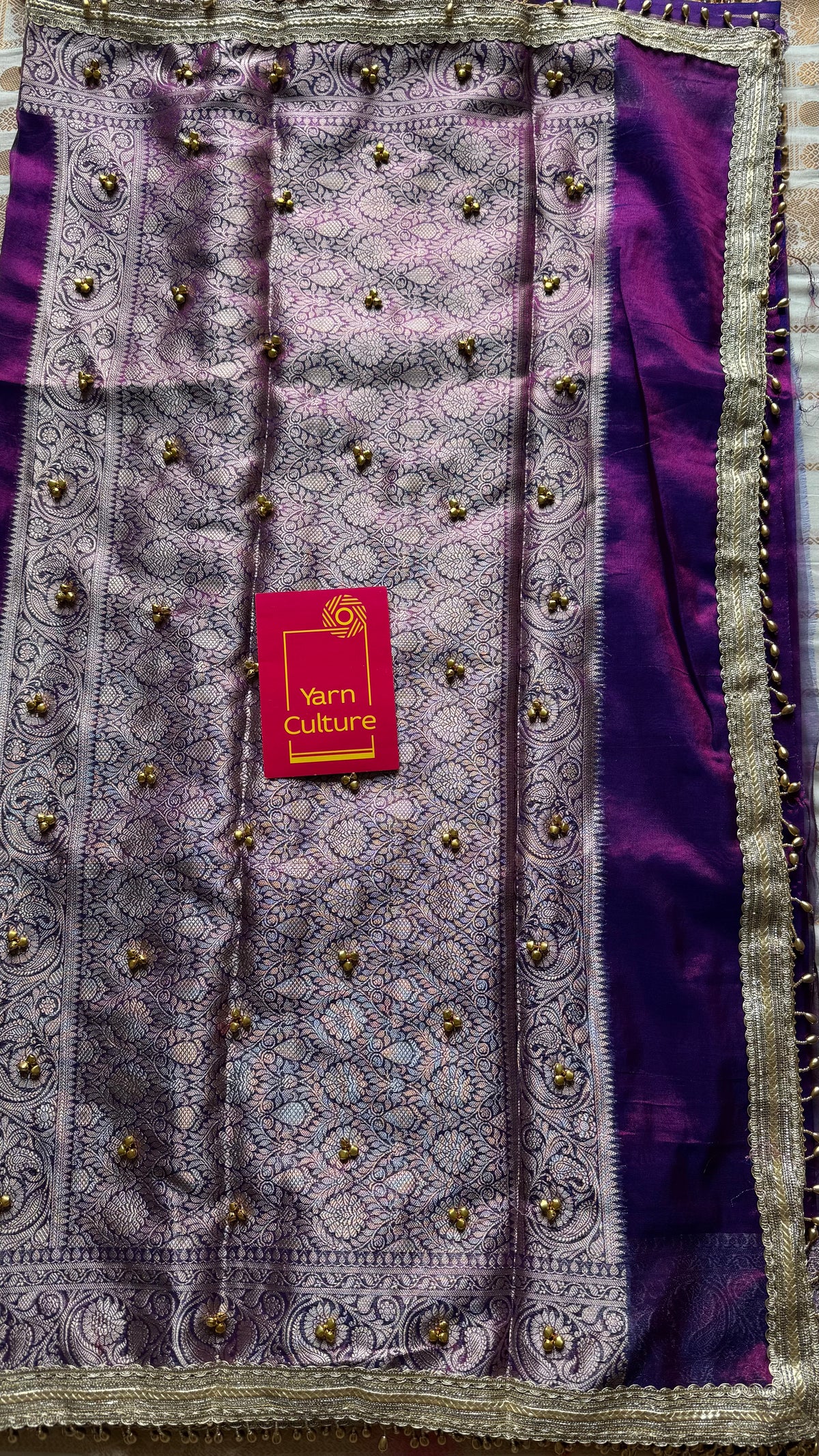Purple gold tissue Banarasi saree with ghungroo embellishments and beaded lace border - YCBLTOC67