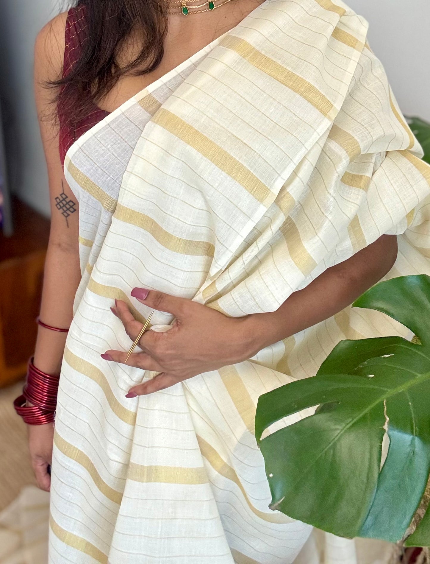 Ivory and gold kerala saree with gold stripes - YCIEON44