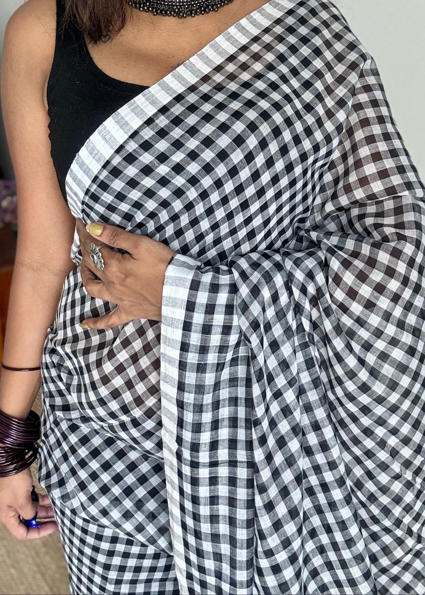 mul cotton saree, checkered saree, check saree, mul cotton saree online, breathable cotton saree summer, soft mul saree India, lightweight summer saree, airy cotton saree, everyday wear saree, comfortable sarees for daily wear, soft handloom cotton saree, checkered cotton saree, checkered mul saree for summer, breathable mul cotton saree for hot weather, lightweight cotton saree for daily wear India, soft and airy sarees for summer styling