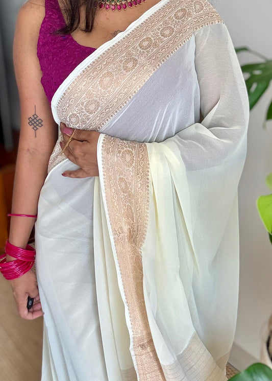 Ivory soft georgette saree, with antique gold zari border - YCIEON87