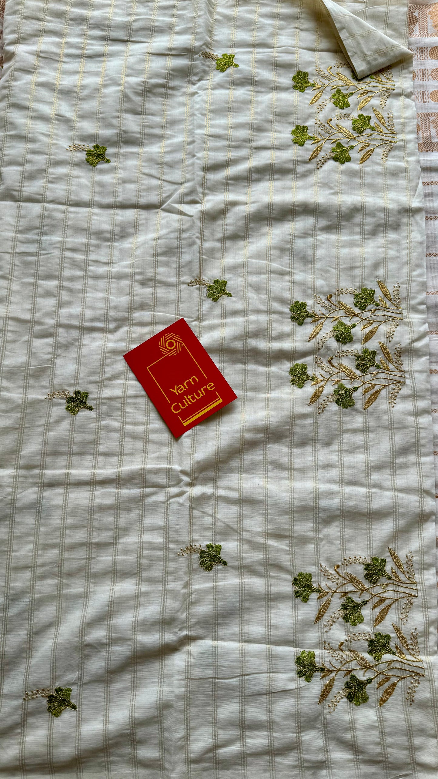 Ivory and gold soft cotton saree, light green floral embroidery  - YCIEON49