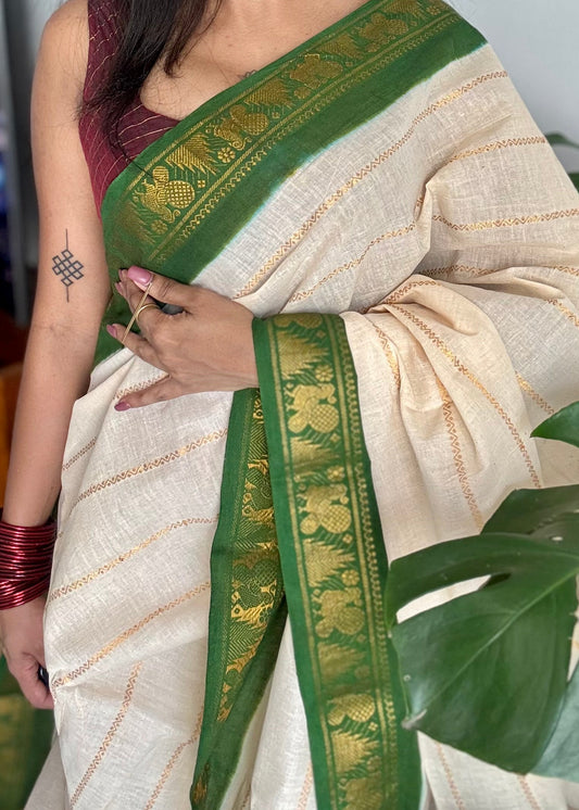Ivory with green contrast velthaari sungudi, kattuchayam dyed madurai cotton - YCIEON104