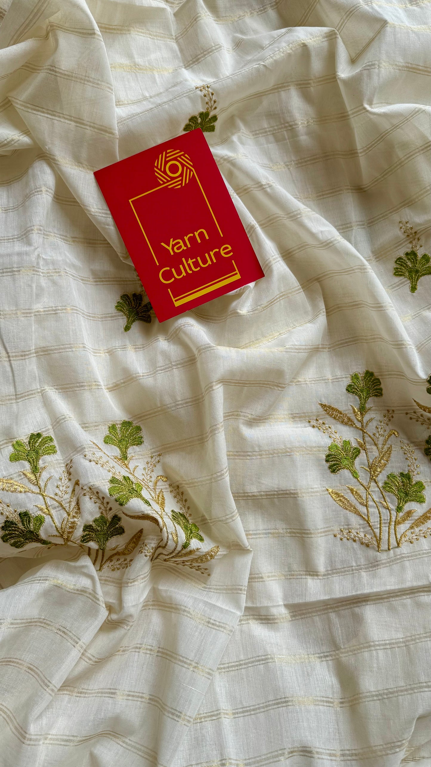 Ivory and gold soft cotton saree, light green floral embroidery  - YCIEON49