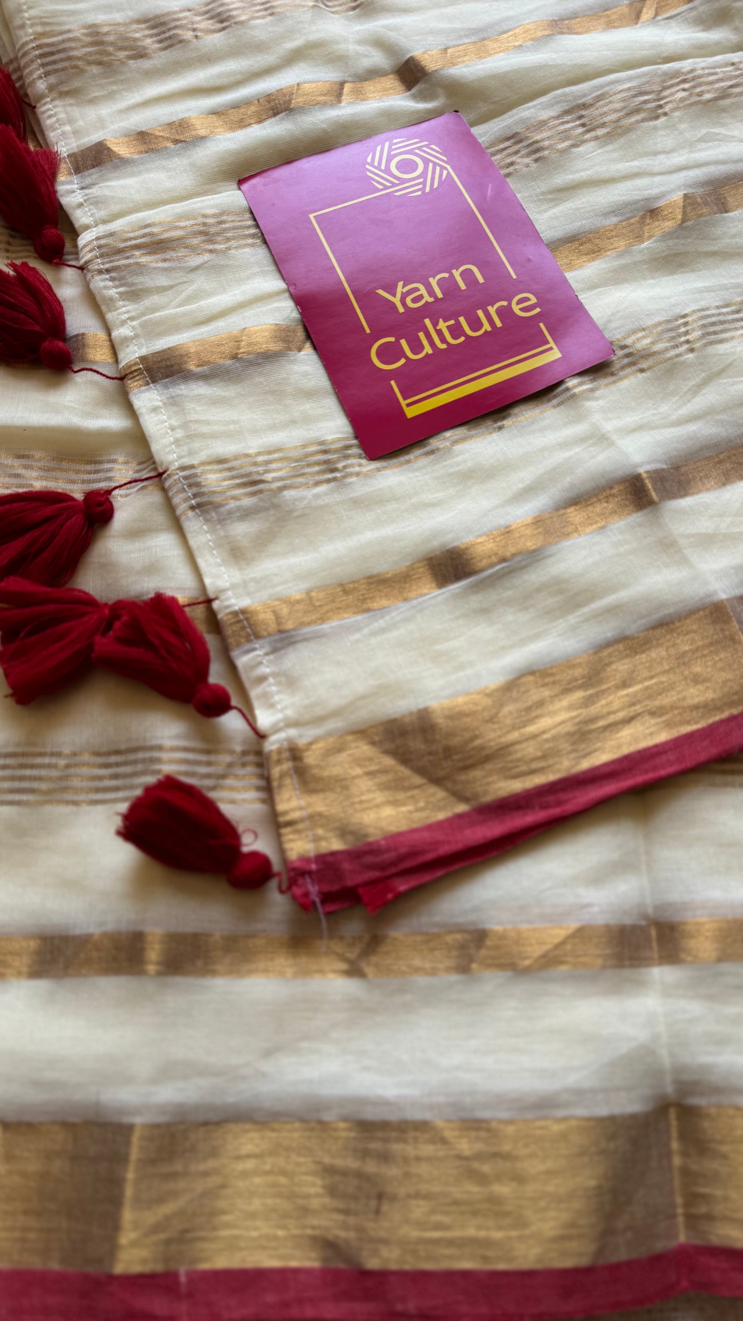 Ivory mul saree with gold stripes and red border - YCIEBCFE327
