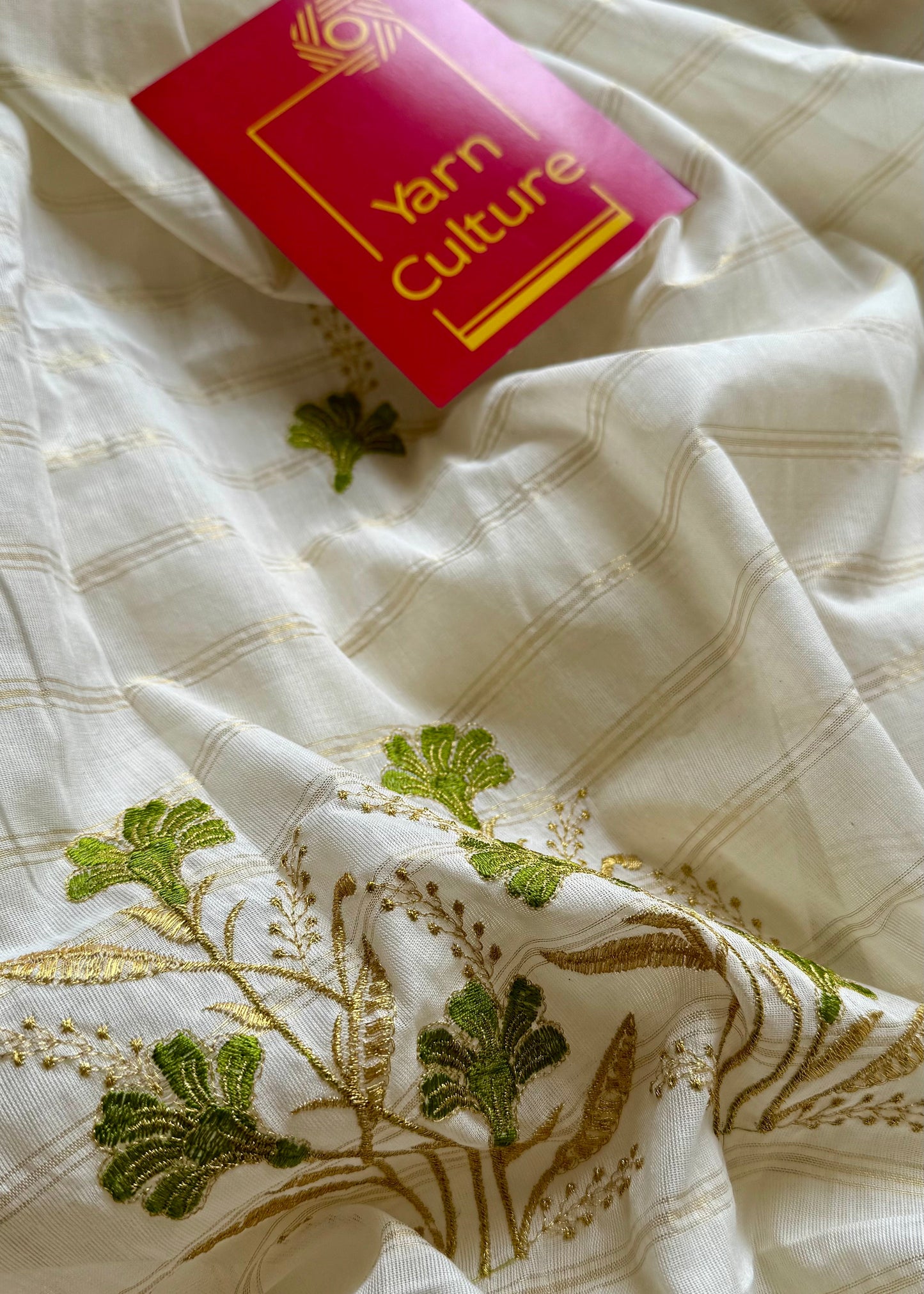 Ivory and gold soft cotton saree, light green floral embroidery  - YCIEON49