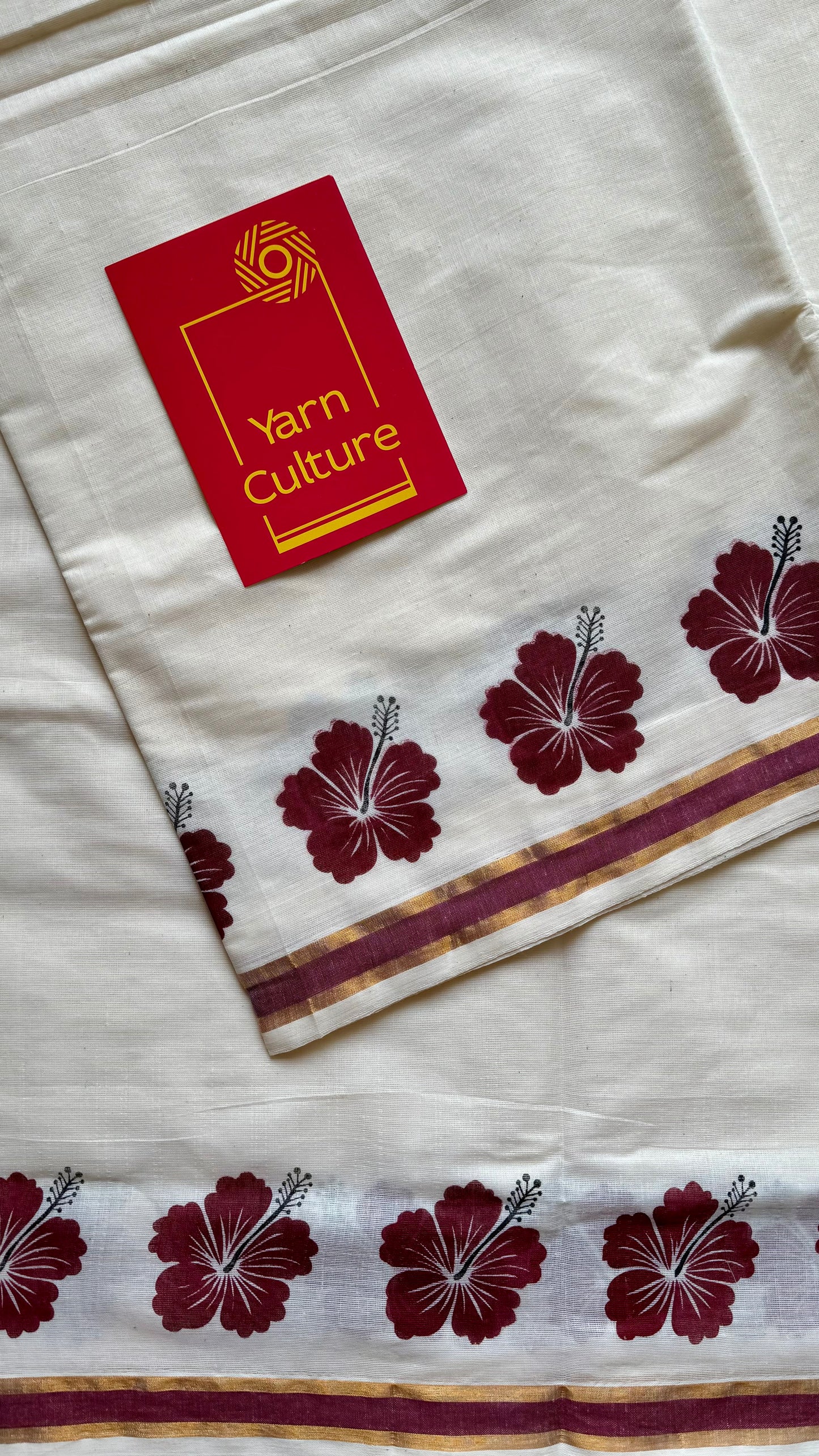 Ivory and gold soft cotton saree, maroon hibiscus (chembarathi) flowers - YCIEON62