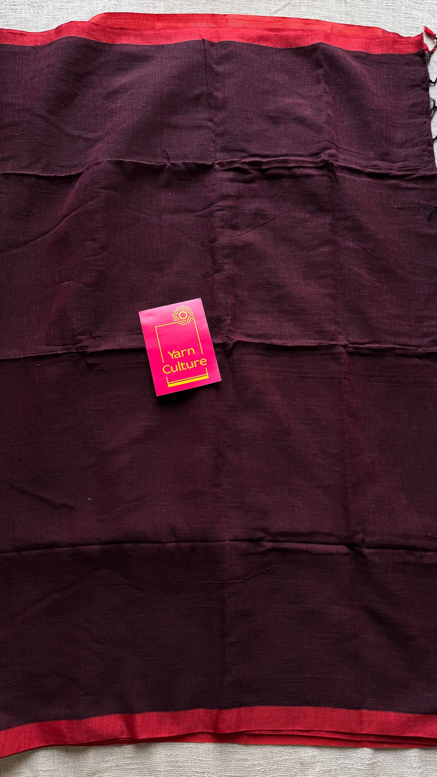 Maroon plain linen by cotton saree with copper zari pallu - YCBCLCFE398