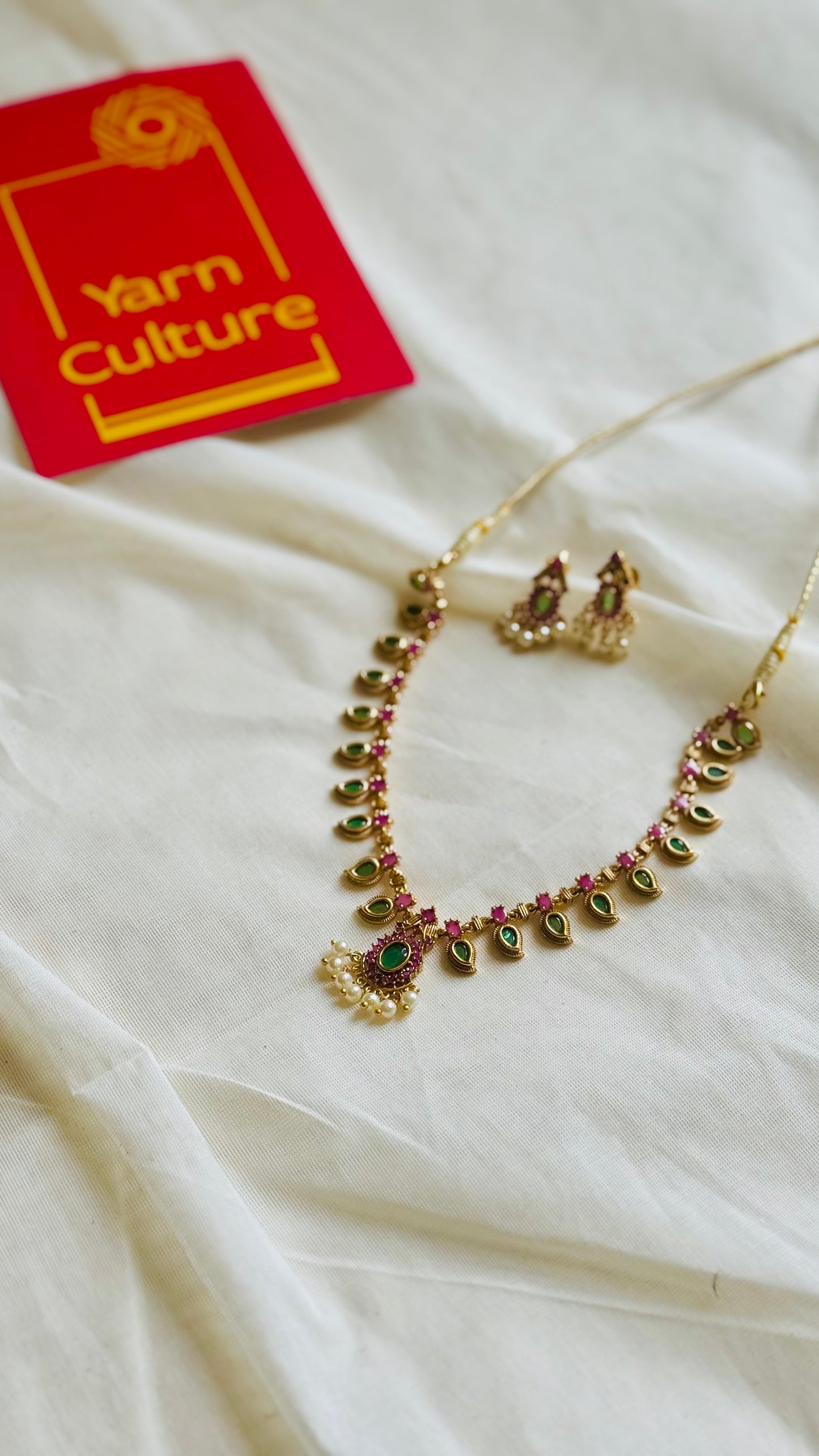Palakka neckpiece with ruby, green and white stones, with earrings - YCGPNP798