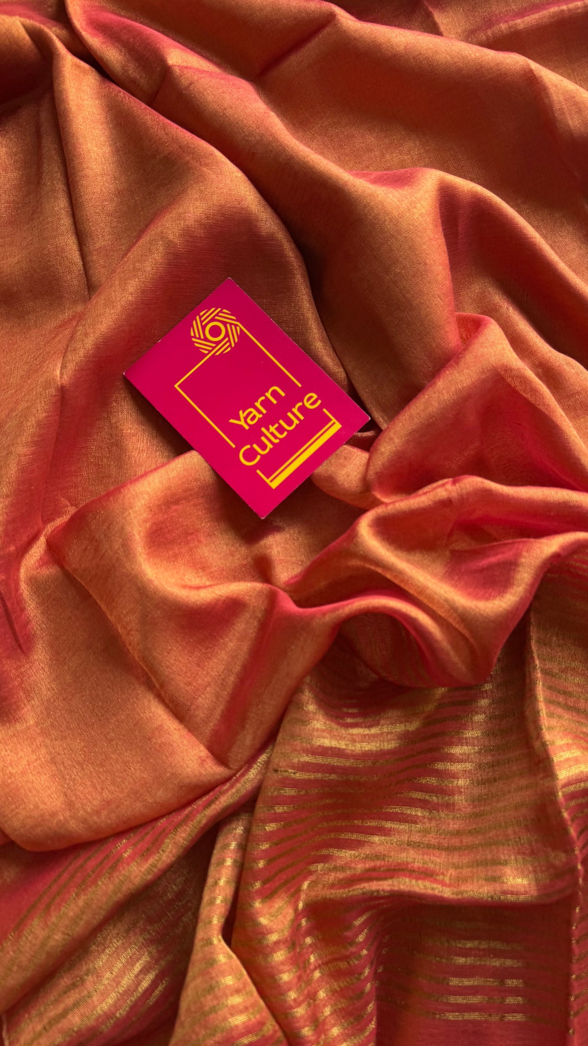 Orange with gold, dual tone metallic tissue linen saree - YCBCLTOC58