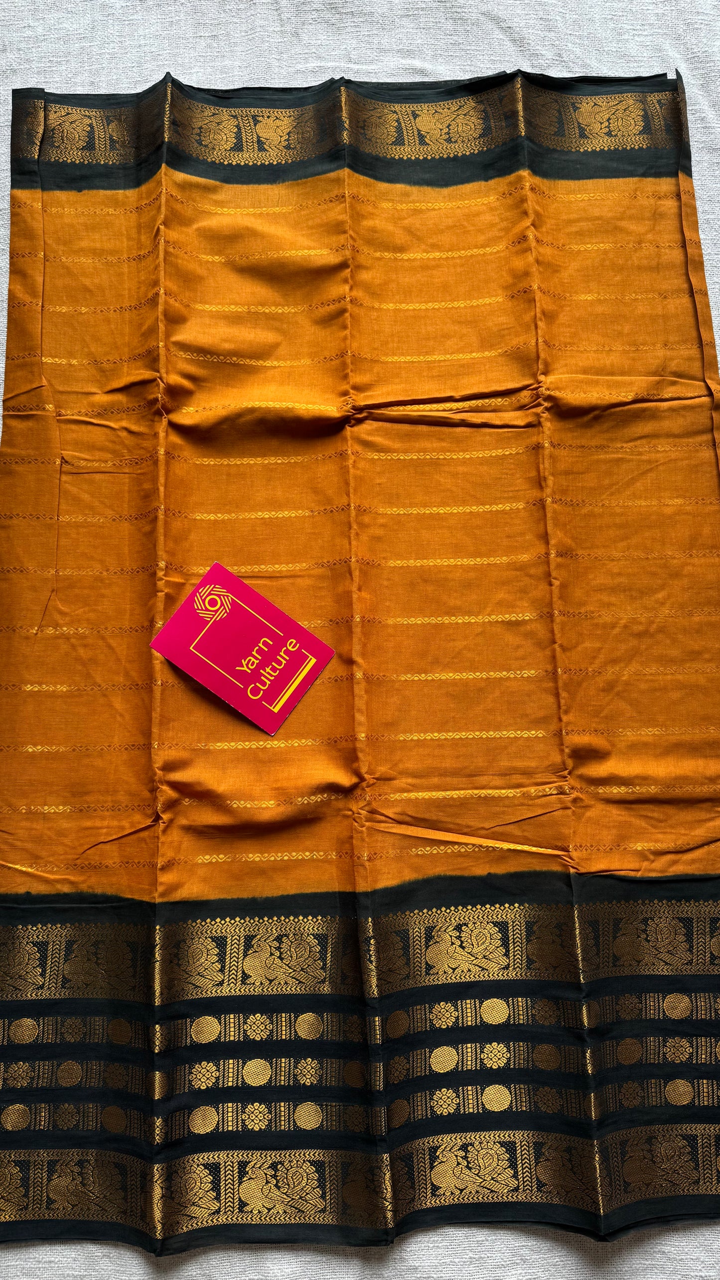 Turmeric yellow with black, peacock rudraksham motif, single side broad zari - madurai kattuchayam dyed - YCCOTNAUS27