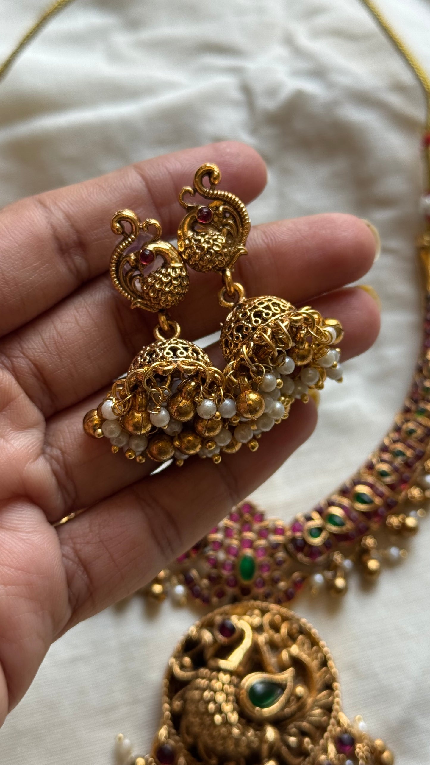 Kemp stones, peacock pendant necklace with jhumkas - YCGPNP469