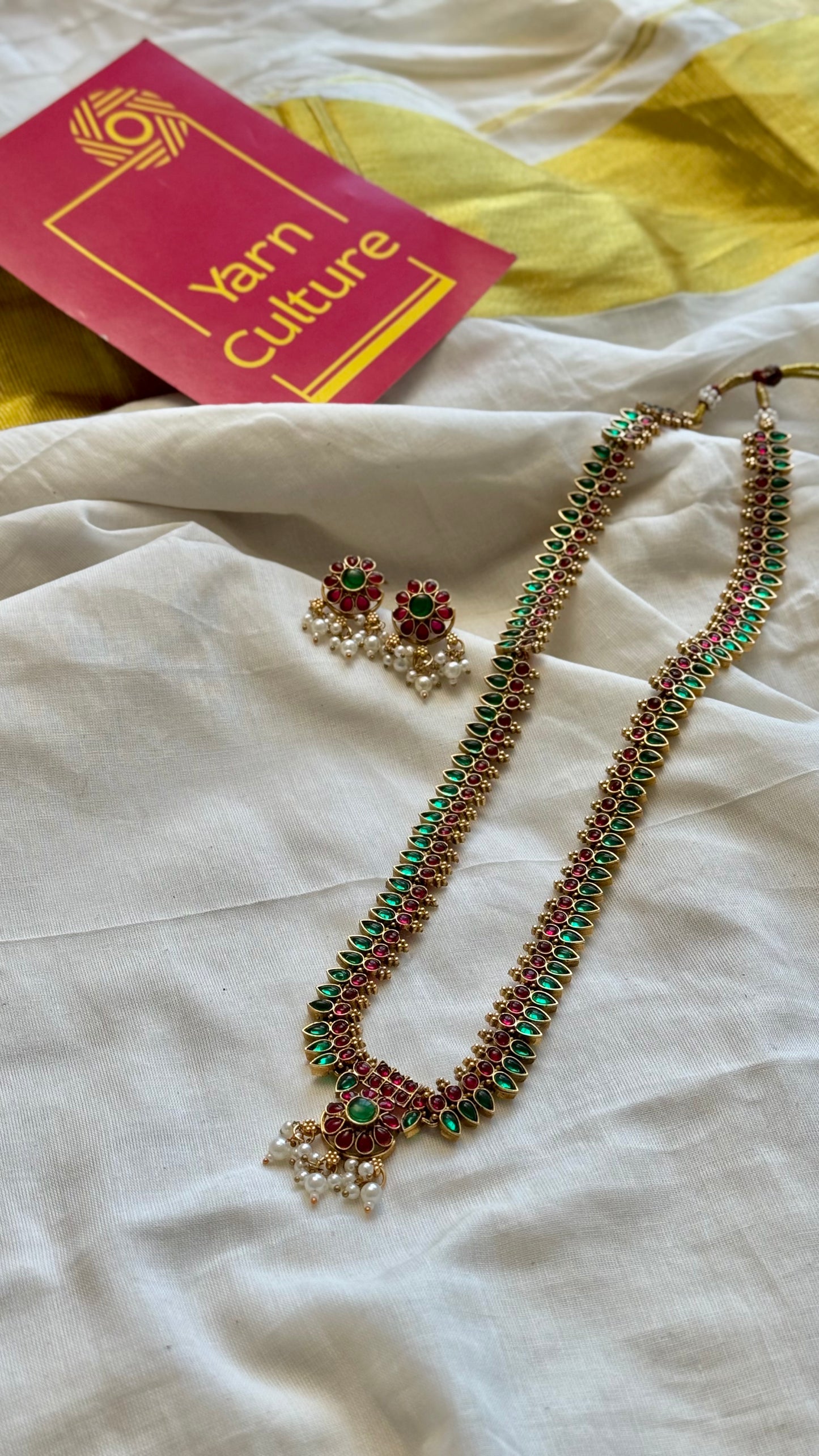 Long mullamottu (bud shaped) green and red neckpiece with earrings - YCGPNP680