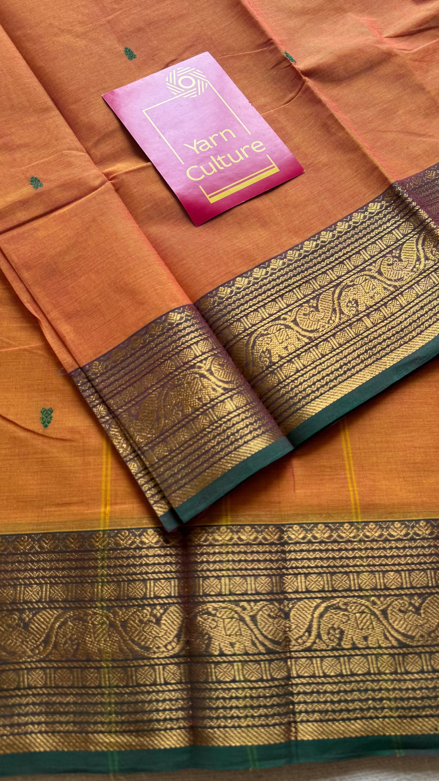 Kanchi cotton saree, light orange with green zari border - YCCOTNAP80