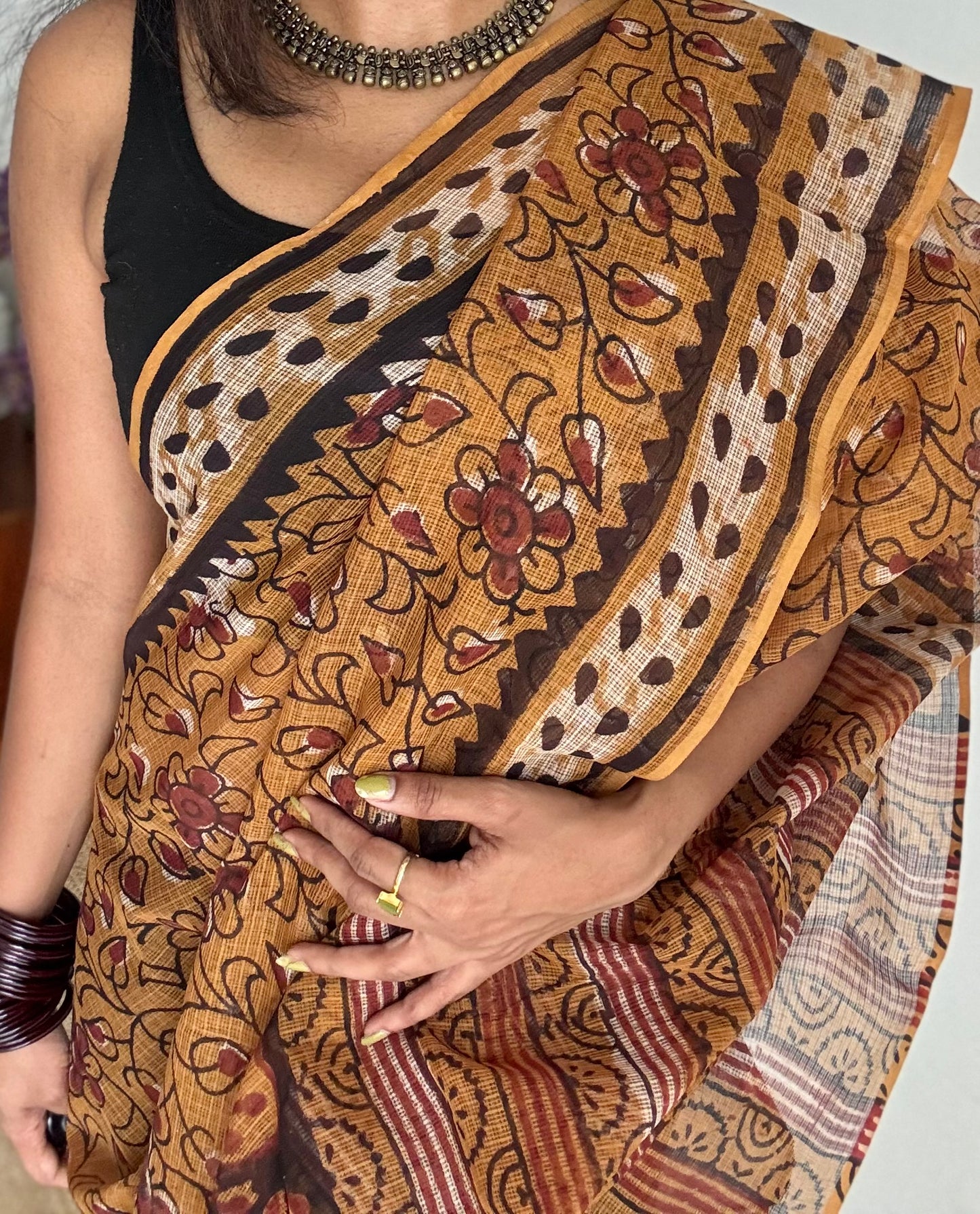 Orange Drama - light orange with brown floral kota doria saree - YCTORKDAP03