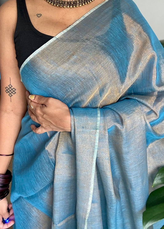 Teal blue with gold, dual tone metallic tissue linen saree - YCBCLTOC59