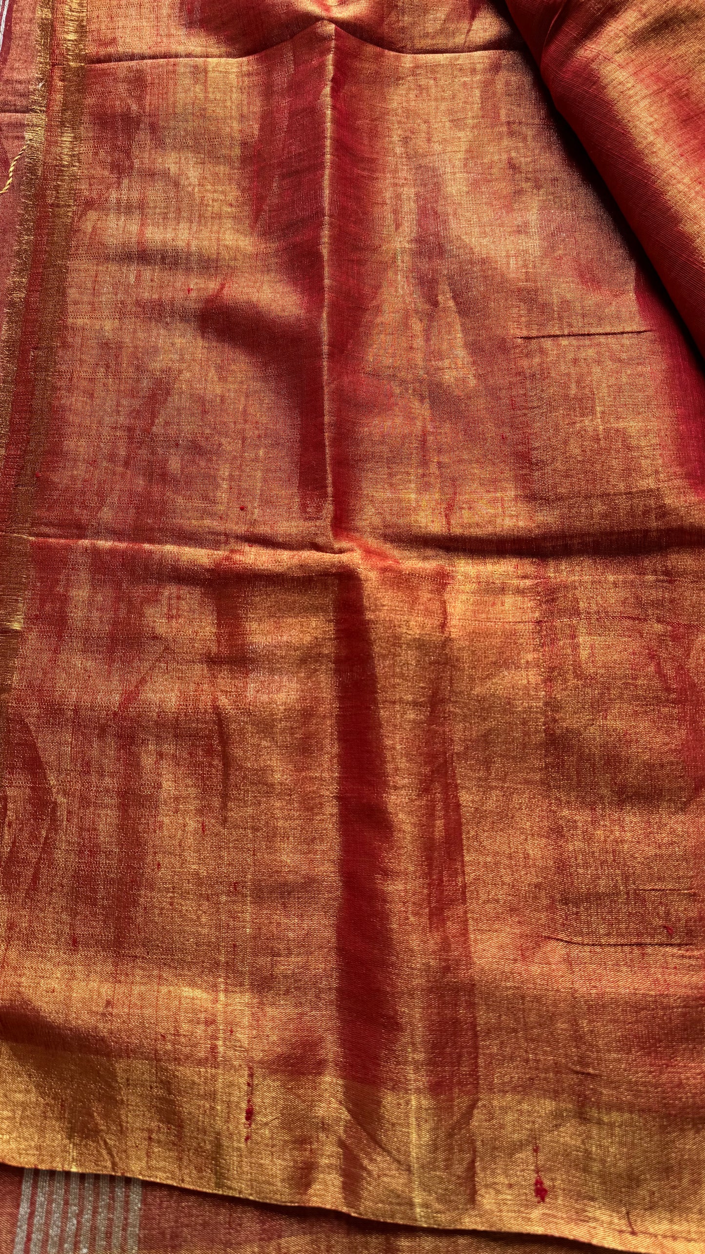 Handwoven orange gold dual tone tissue linen saree with lotus motifs - YCBCLTFE399