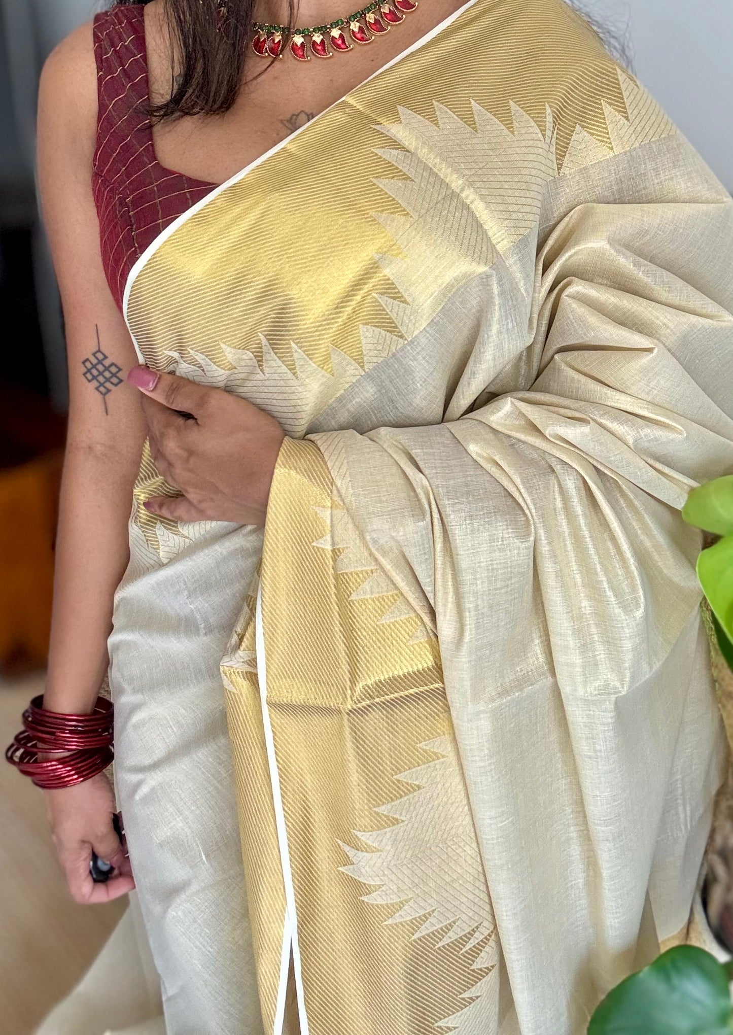 Ivory and gold soft tissue cotton saree, temple motif border - YCIEON81