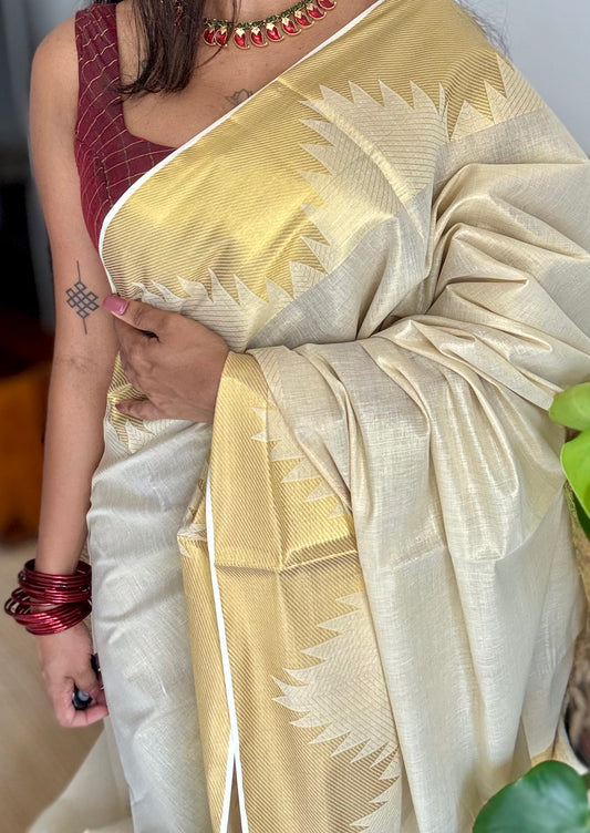 Ivory and gold soft tissue cotton saree, temple motif border - YCIEON153