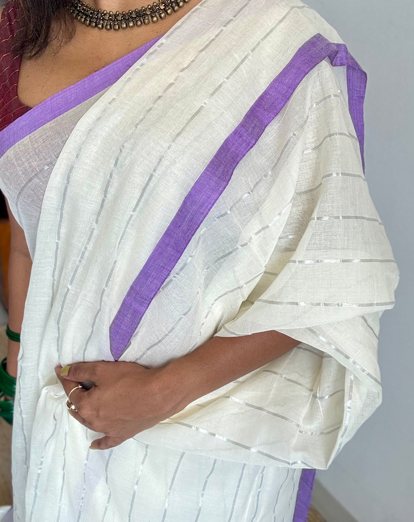 Ivory mul saree with silver zari stripes and purple border - YCBCMCFE288