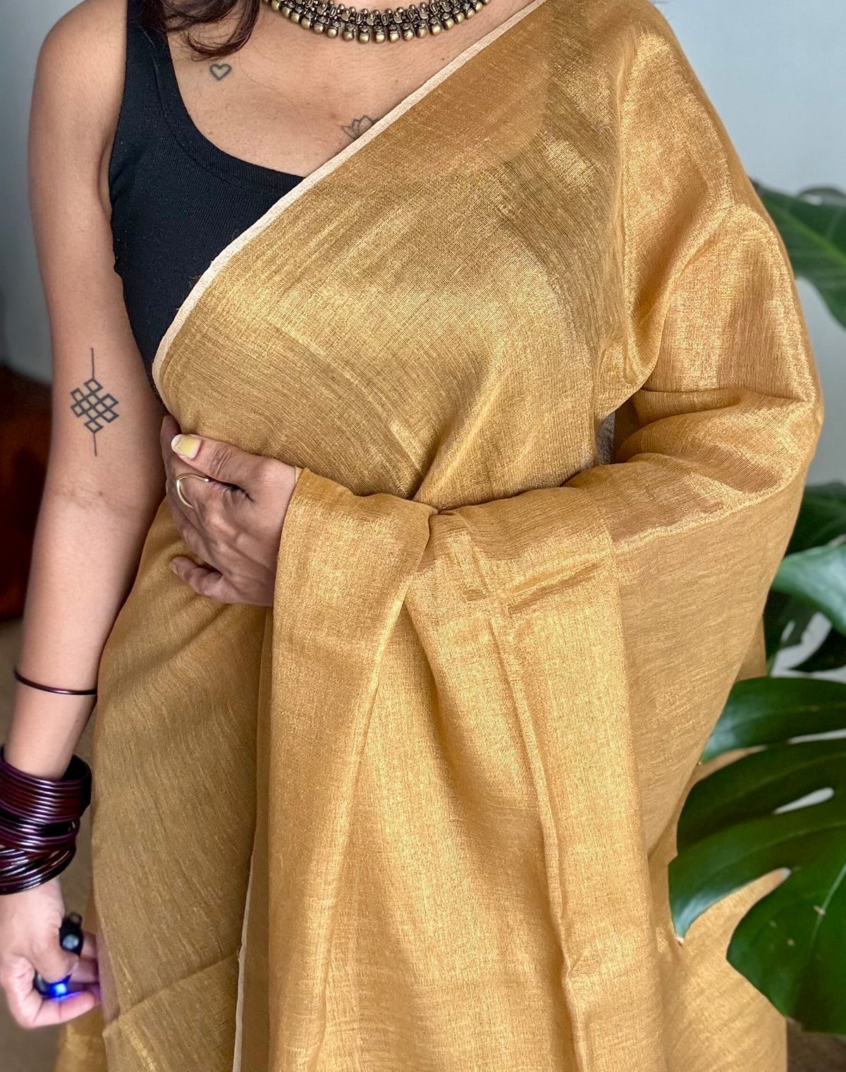 Plain gold, dual tone metallic tissue linen saree - YCBCLTOC60