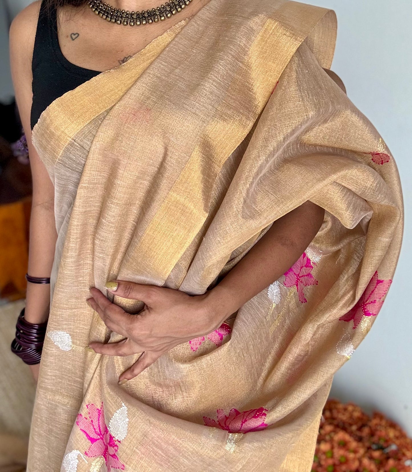 Handwoven ivory gold dual tone tissue linen saree with lotus motifs - YCBCLTFE400