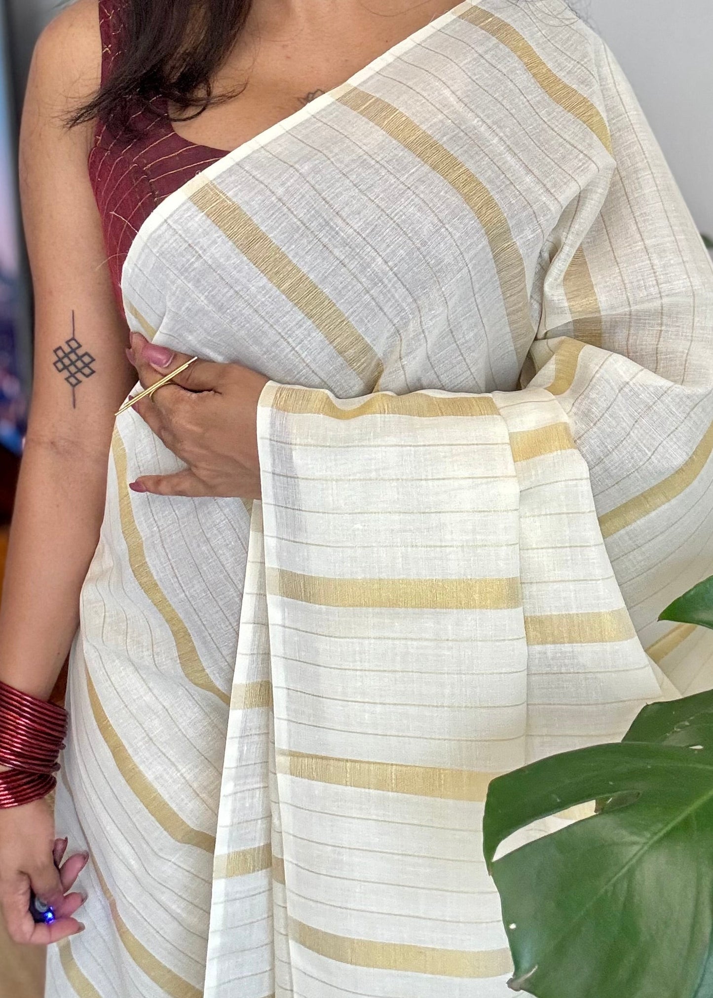 Ivory and gold kerala saree with gold stripes - YCIEON44
