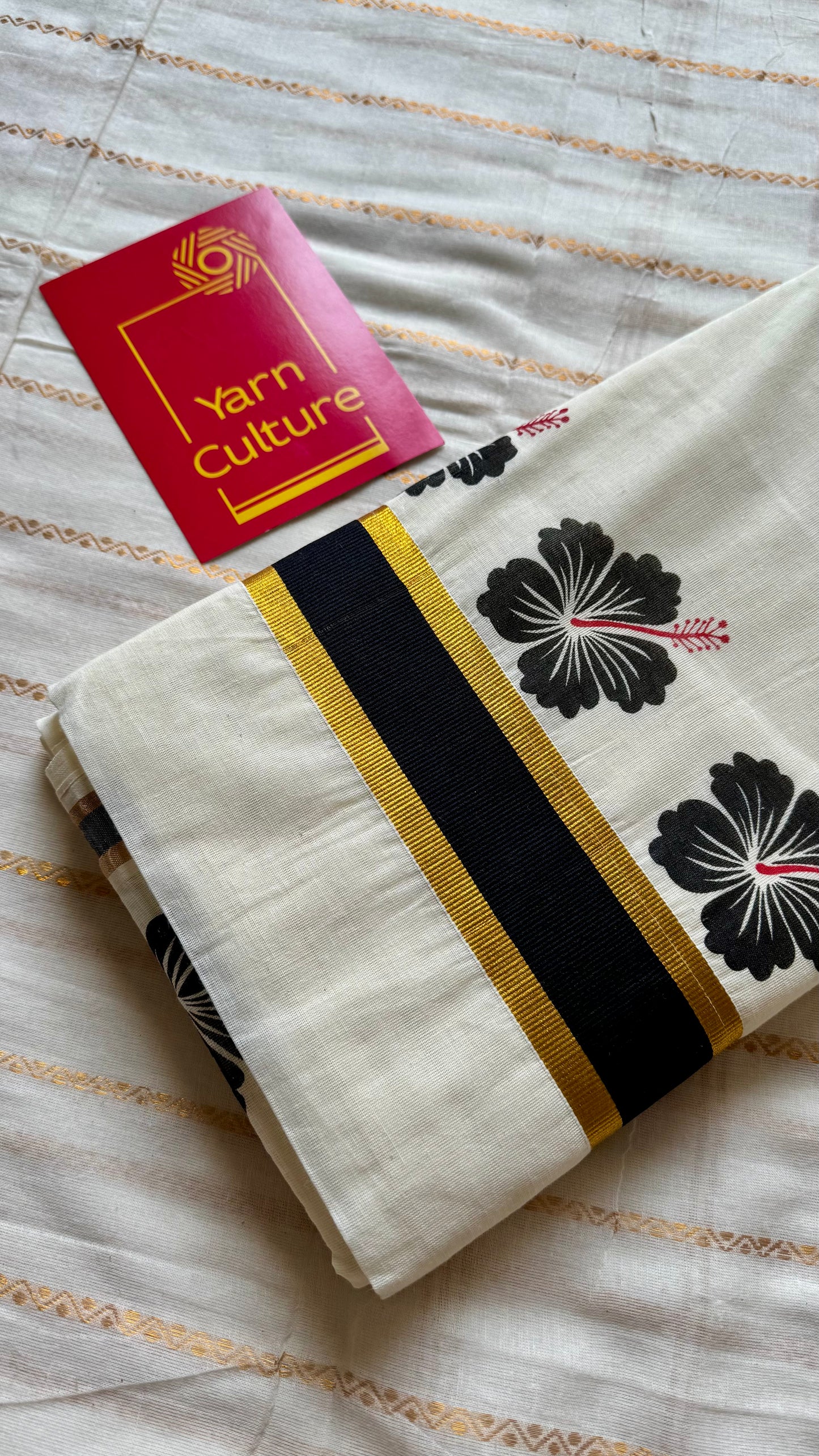 Ivory and gold soft cotton saree, black hibiscus (chembarathi) flowers - YCIEON61