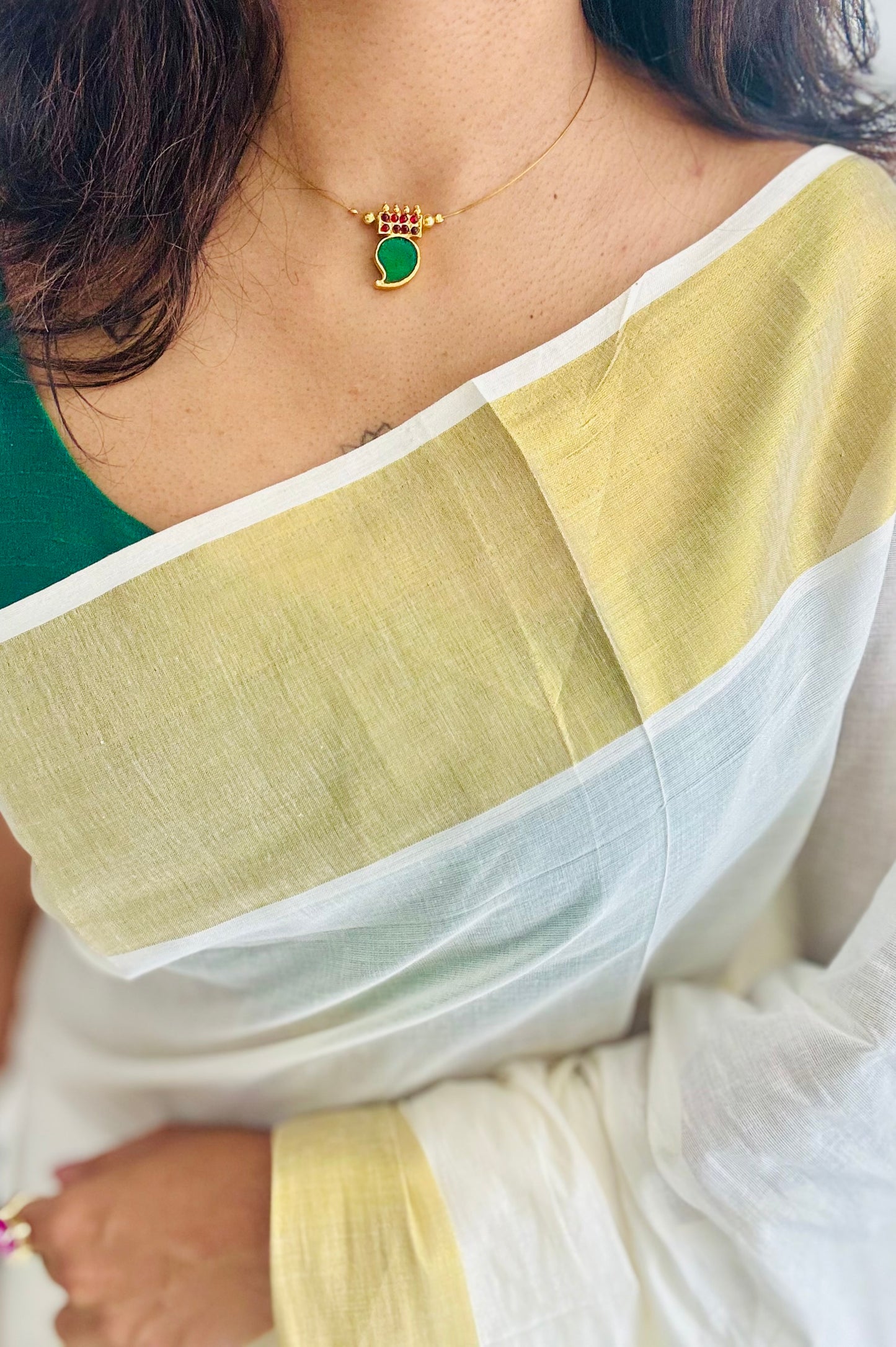 Single mango palakka pendant in invisible chain - YCAGC102