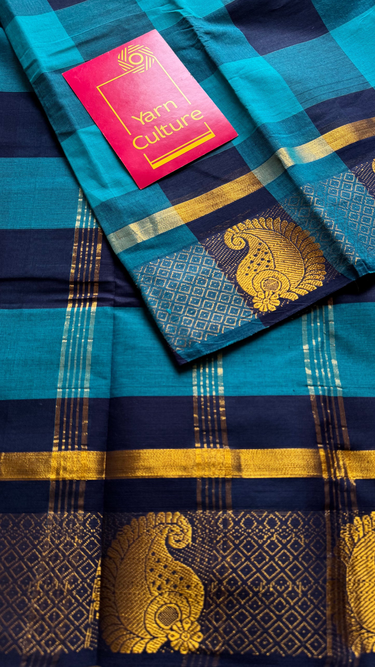 Chettinad cotton saree with sky blue and navy checks, paisley motif border - YCCOTNAP62