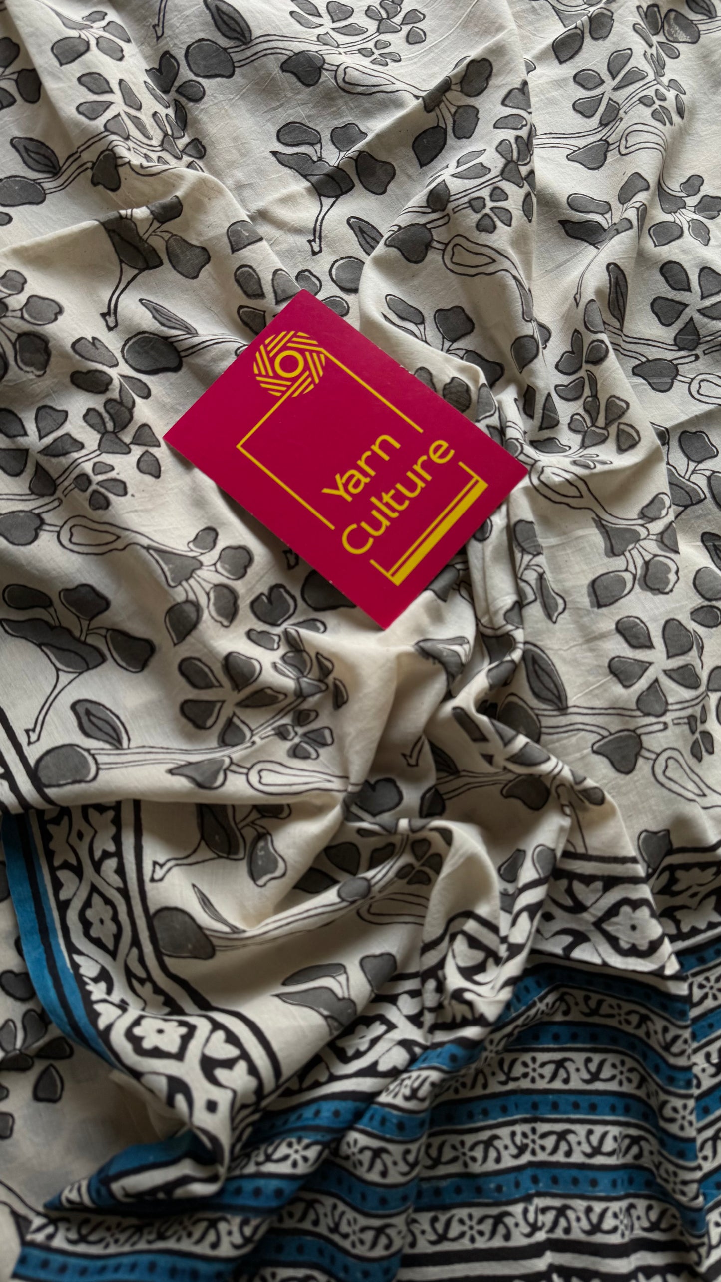 Beige with grey flowers, blue border, block printed soft cotton saree - YCTORCMA14