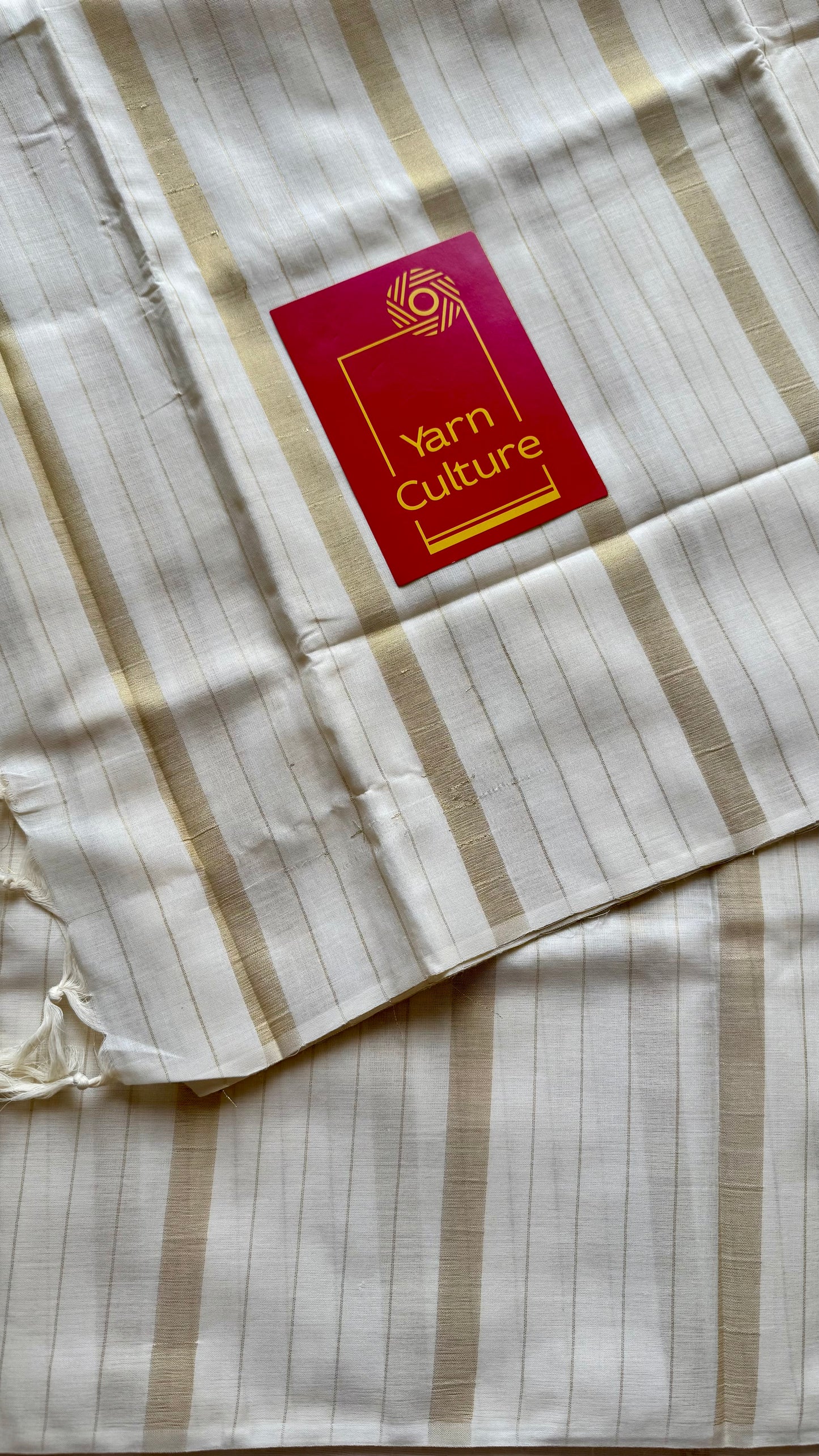 Ivory and gold kerala saree with gold stripes - YCIEON44