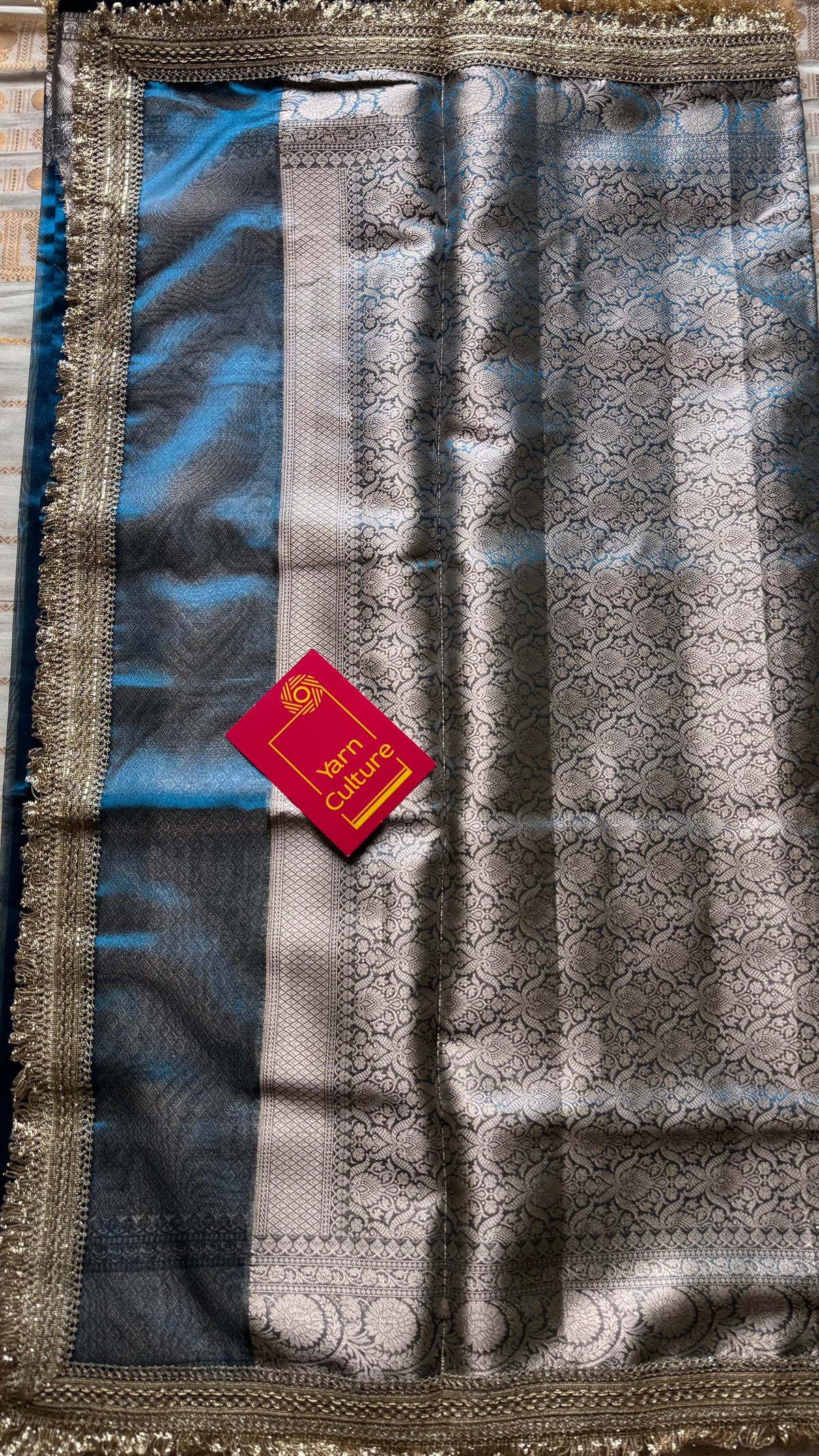 Peacock blue tissue Banarasi saree with embellished gold lace border - YCBLTOC77