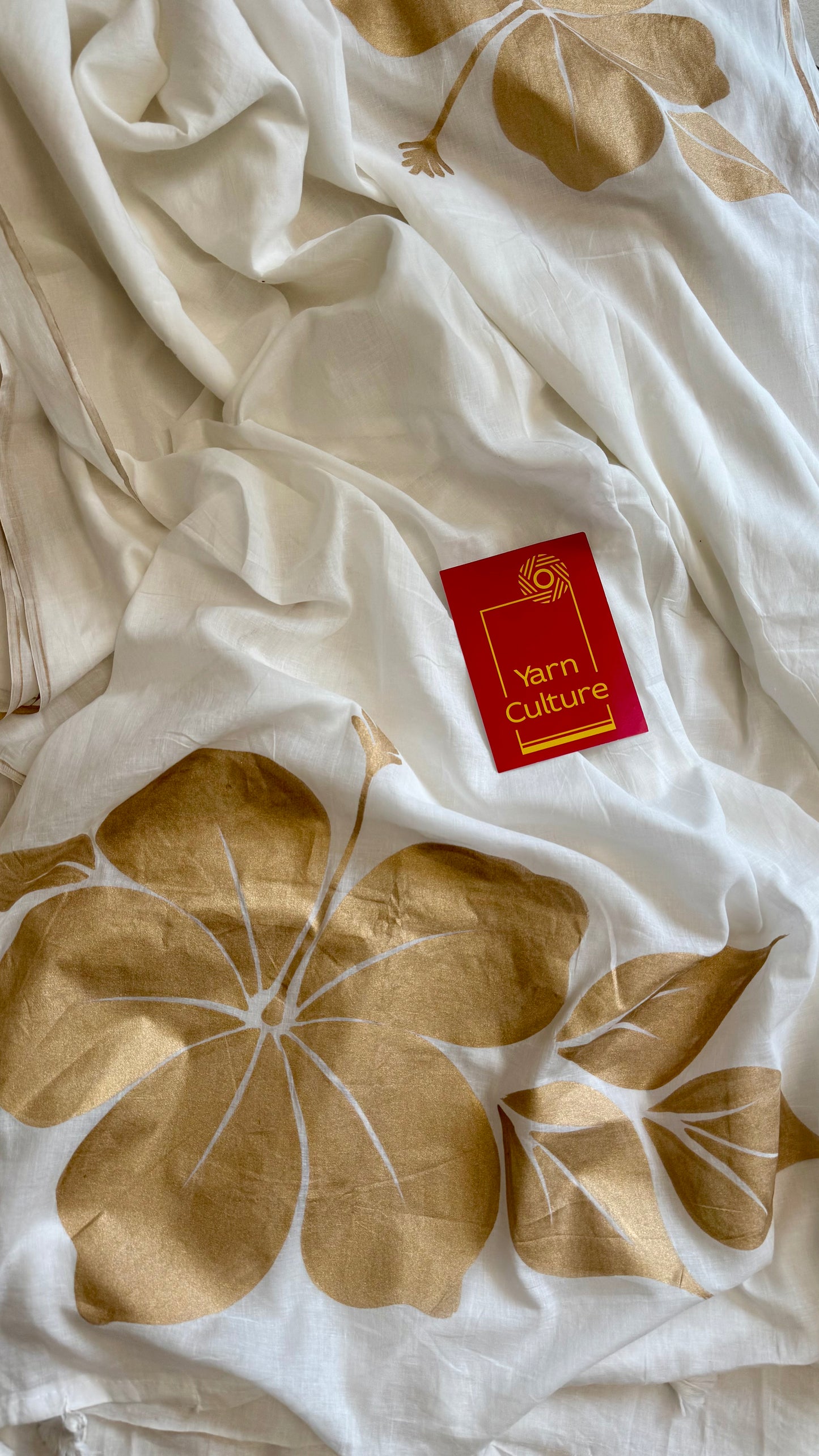 Ivory mul saree, statement floral painted pallu - YCIEON35