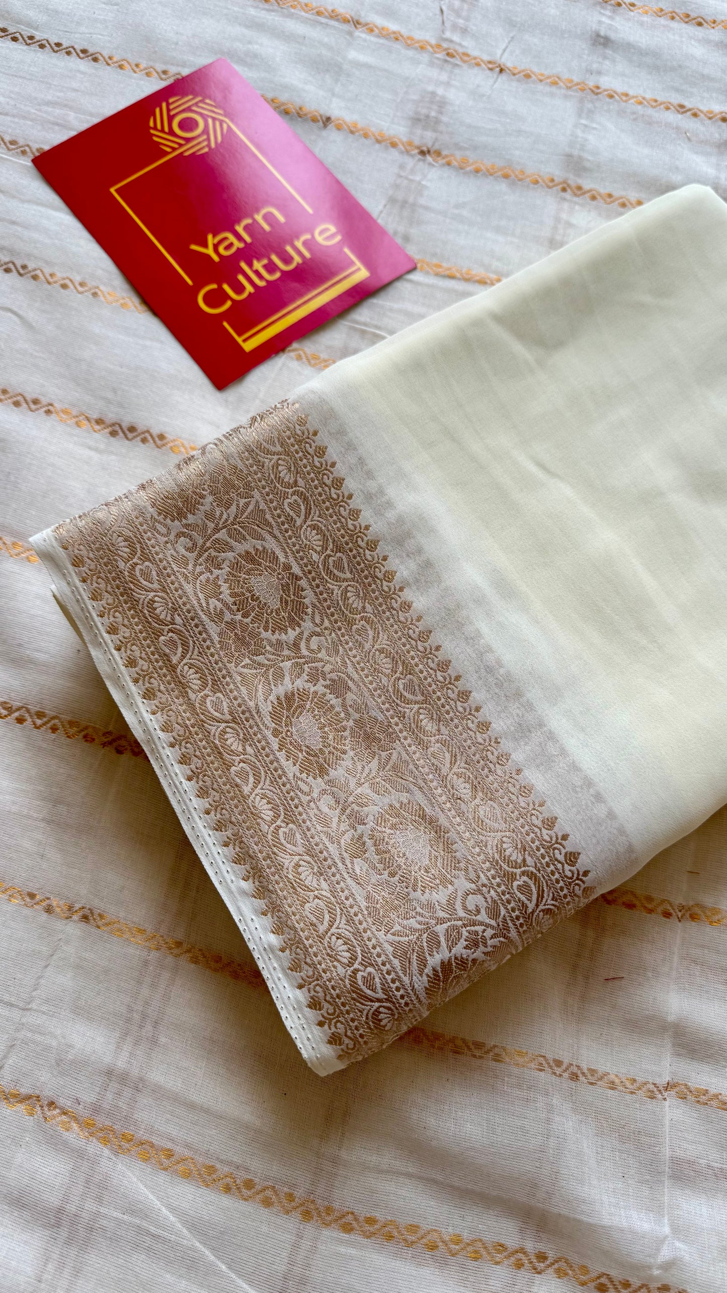 Ivory soft georgette saree, with antique gold zari border - YCIEON87