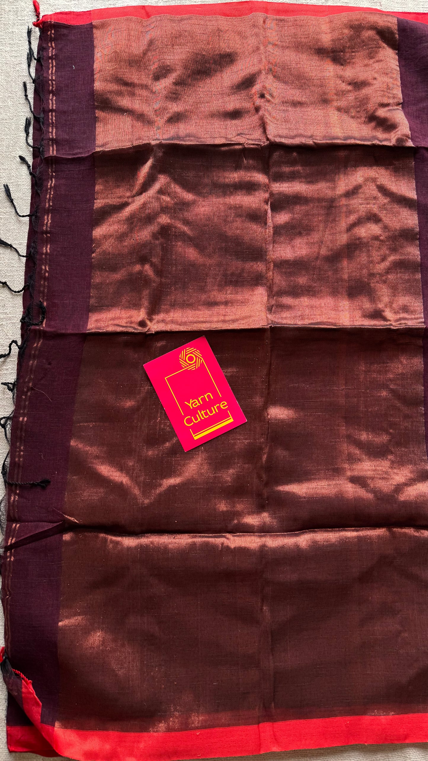 Maroon plain linen by cotton saree with copper zari pallu - YCBCLCFE398