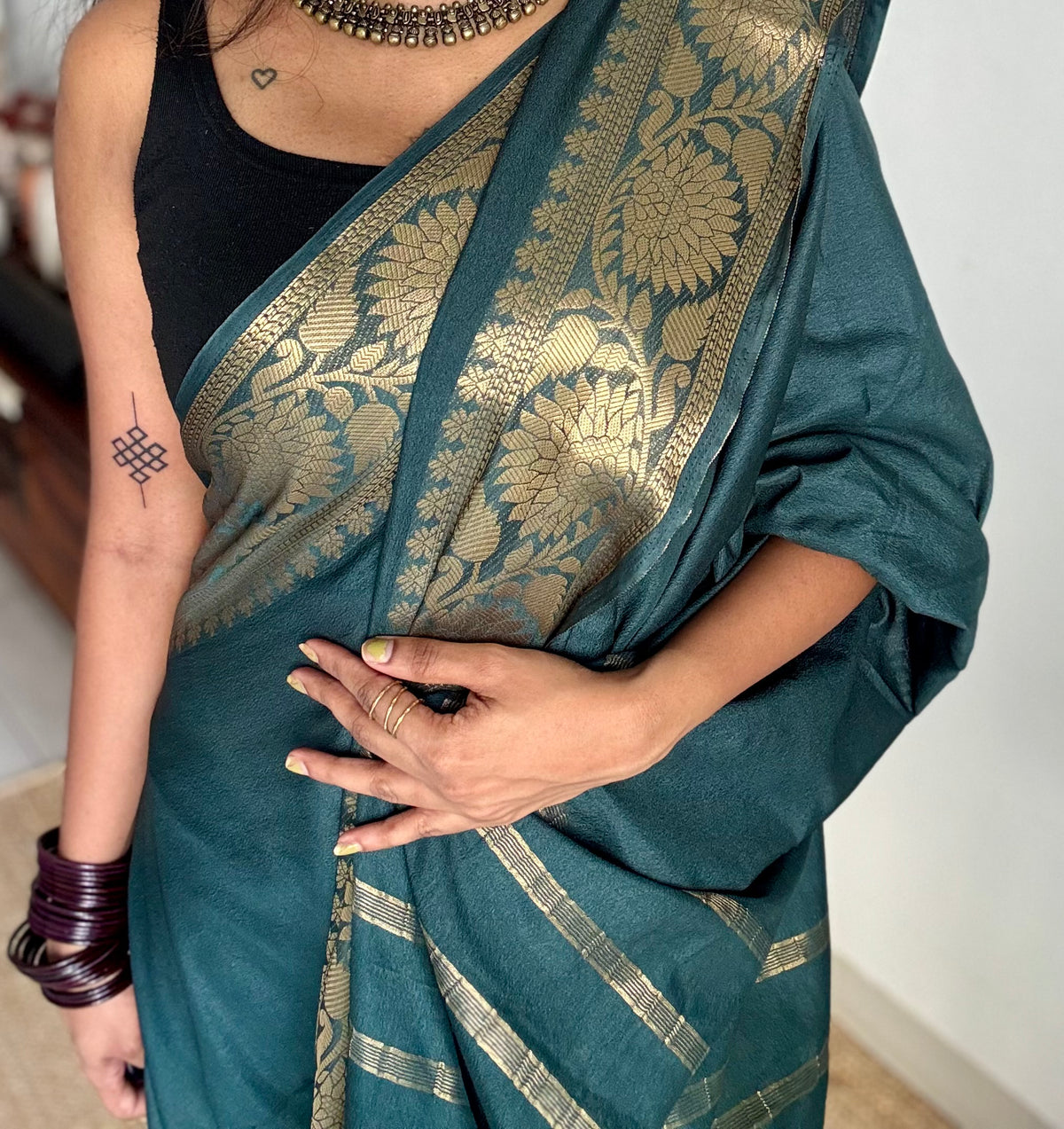 Dark green, semi crepe silk saree with antique gold floral border - YCLOKOC57