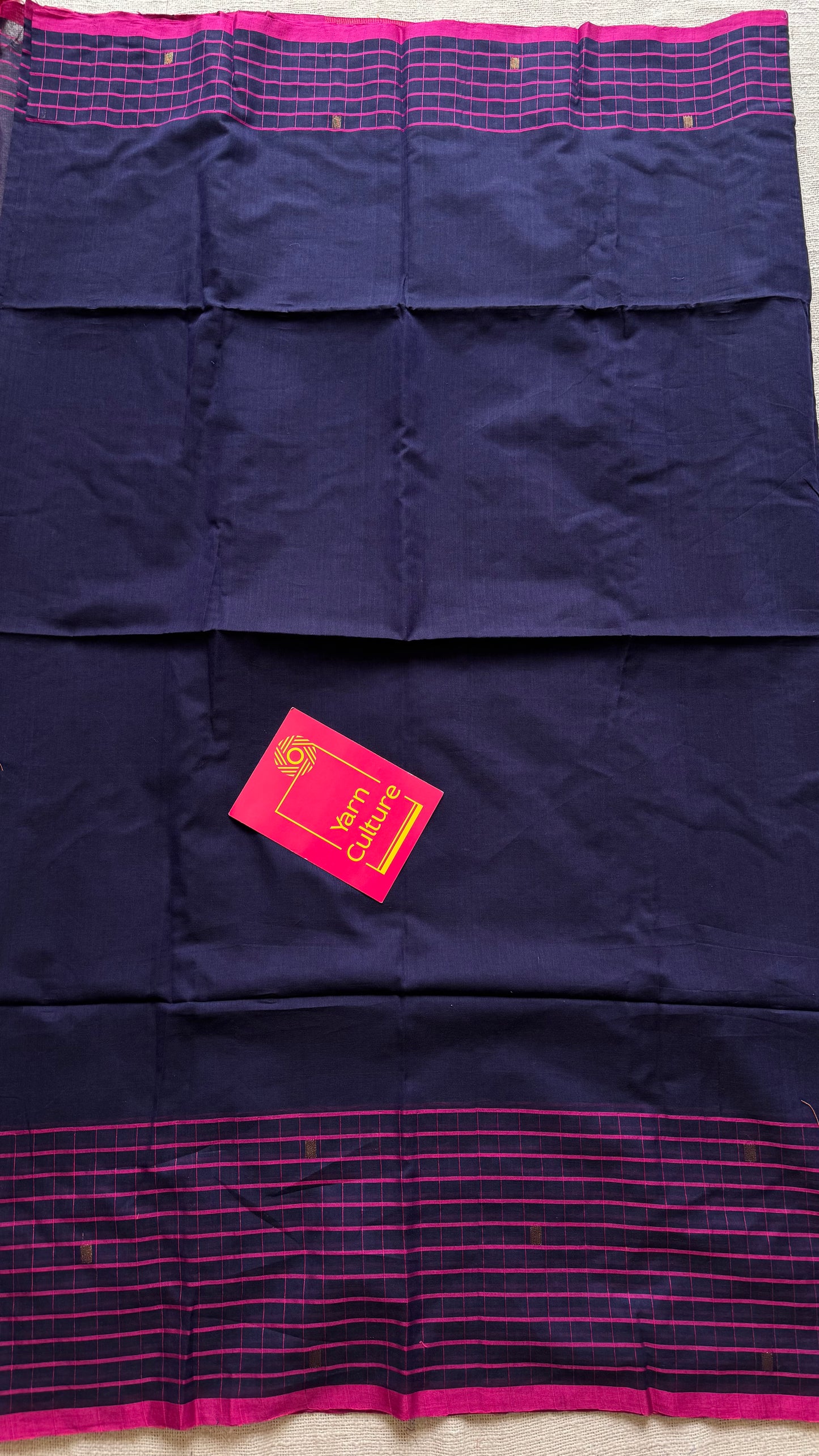 Navy handloom mul saree with hot pink checkered borders and antique gold buttas - YCBCMCFE386