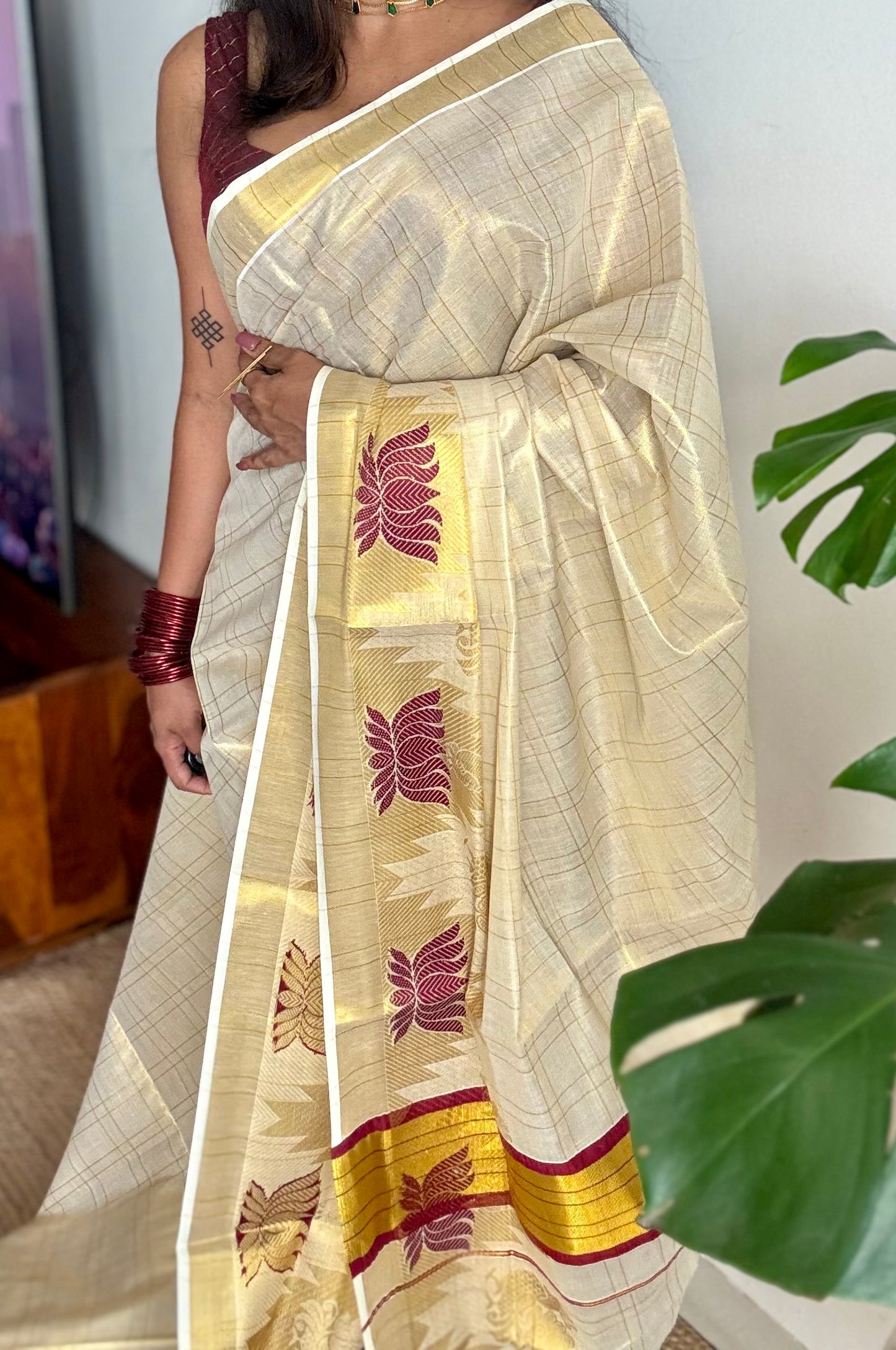 Ivory and gold kerala kasavu saree, maroon lotus motif border - YCIEON48