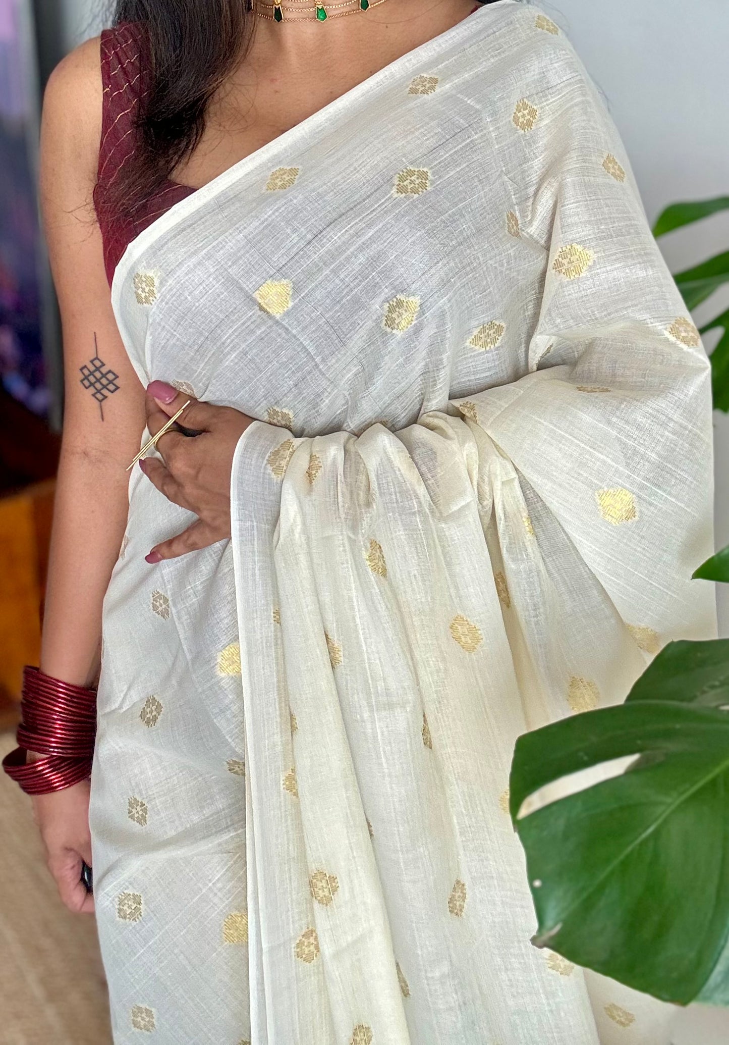 Ivory and gold kerala saree with woven buttas, striped pallu - YCIEON43