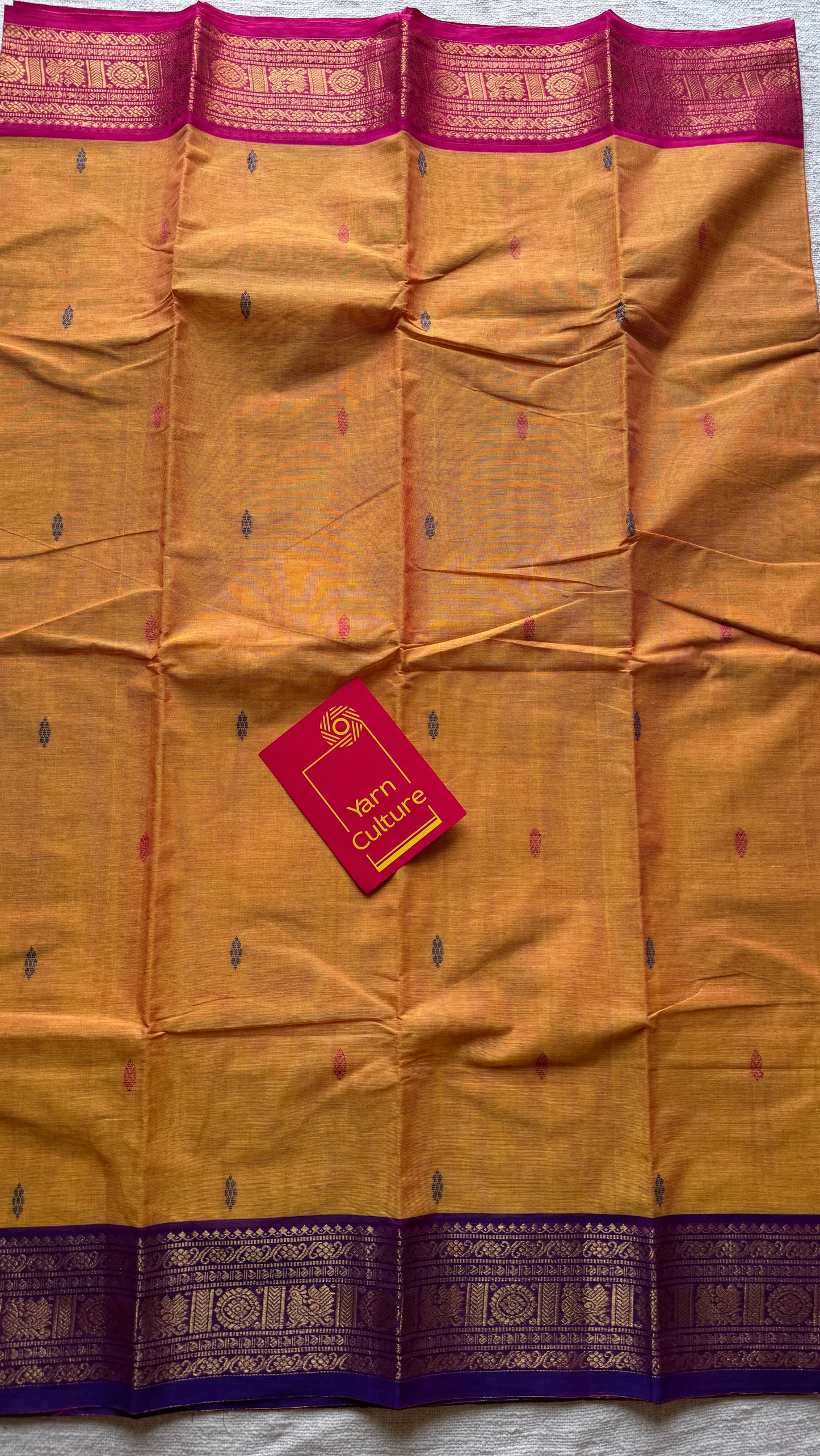 Light orange with hot pink and purple contrast, kanchi cotton saree - YCCOTNMA325