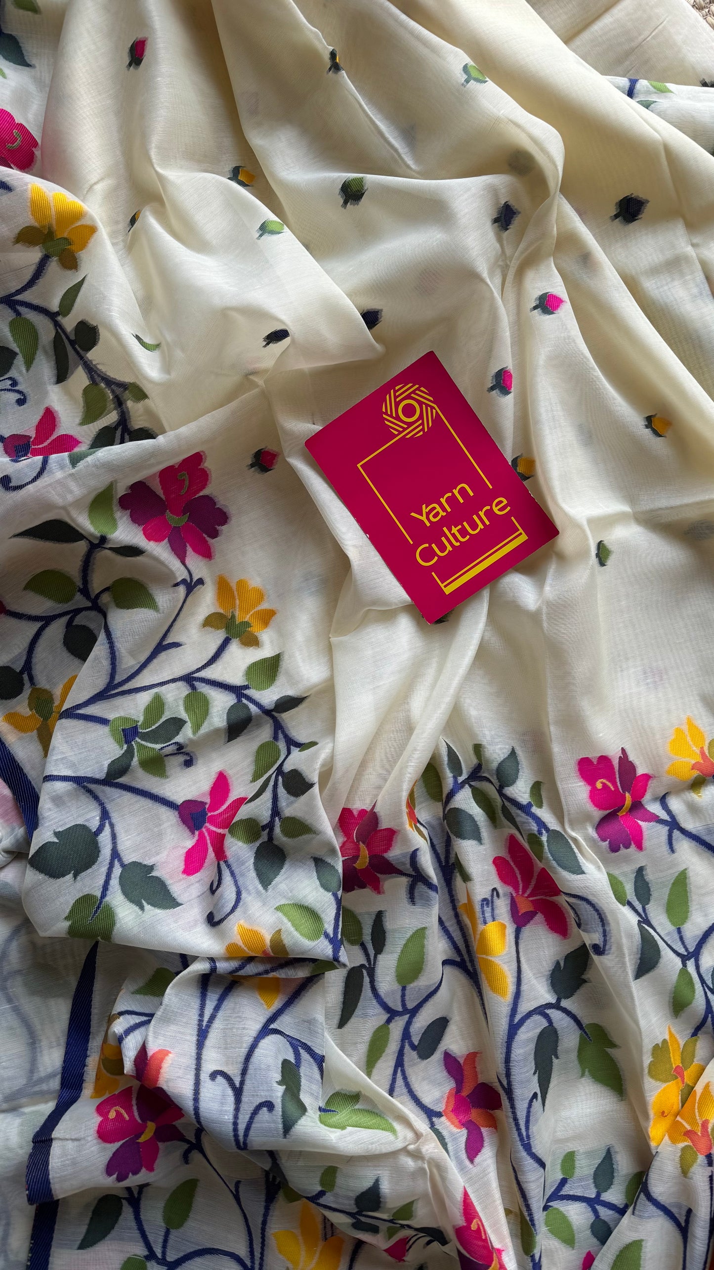 Ivory with navy blue border and multicolour floral motifs, cotton saree - YCIEBCFE325