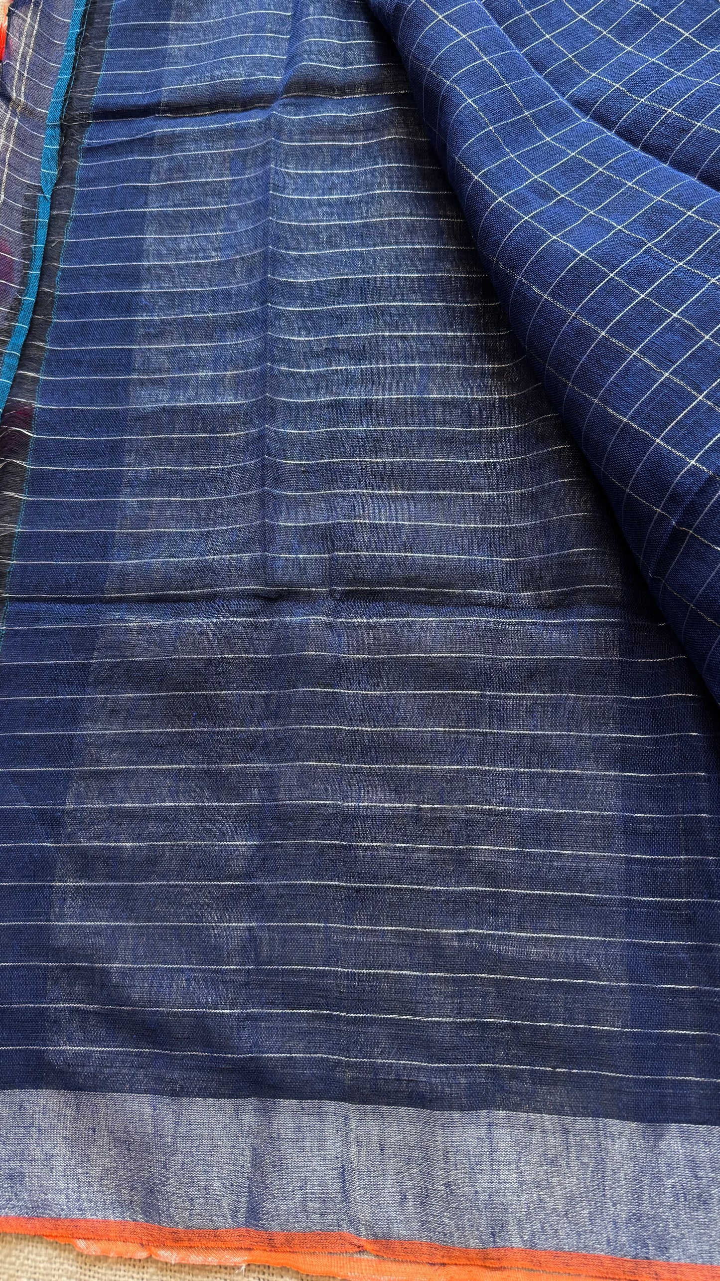 Navy blue linen by cotton saree, silver checks & zari pallu - YCBCLCFE392