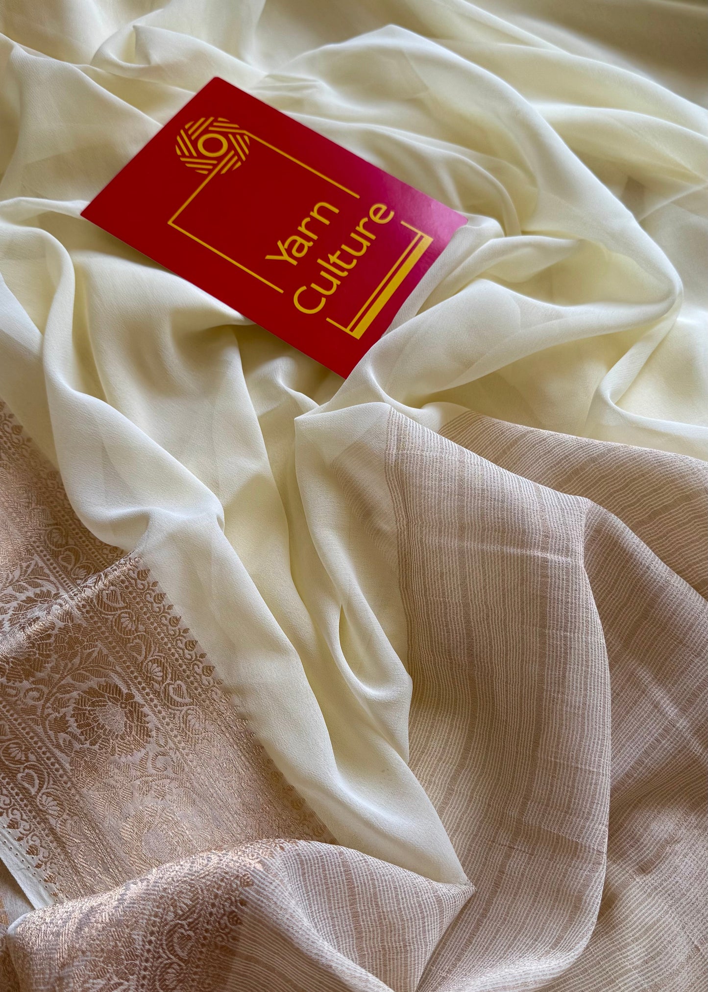 Ivory soft georgette saree, with antique gold zari border - YCIEON87