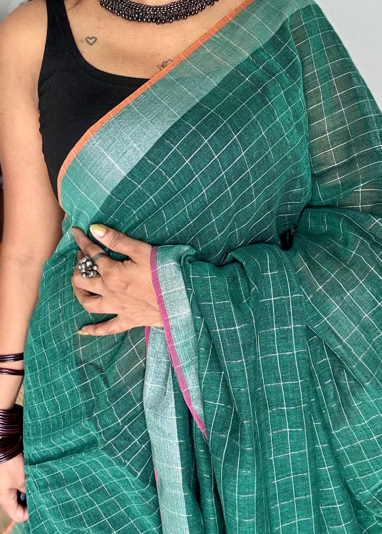 Green linen by cotton saree, silver checks & zari pallu - YCBCLCFE390