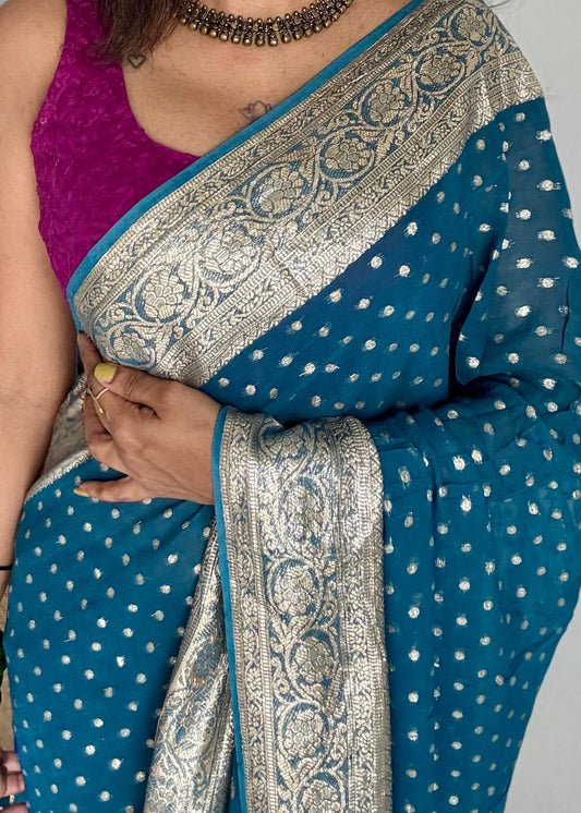 Peacock blue viscose georgette saree with zari motifs - YCDOSFE209
